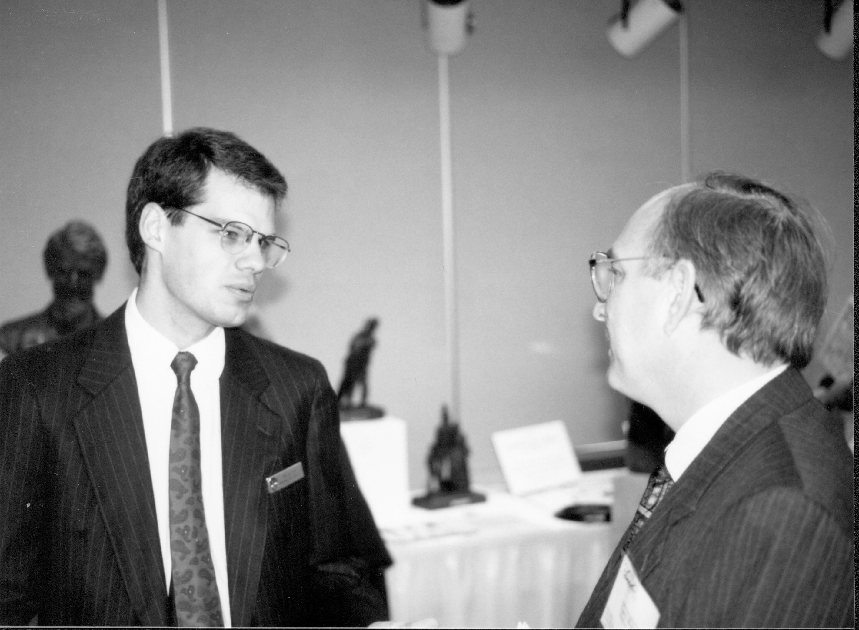 Closeup of two men talking. Lincoln Colloquium; UIS Roll#2, 3of4 Lincoln, Colloquium