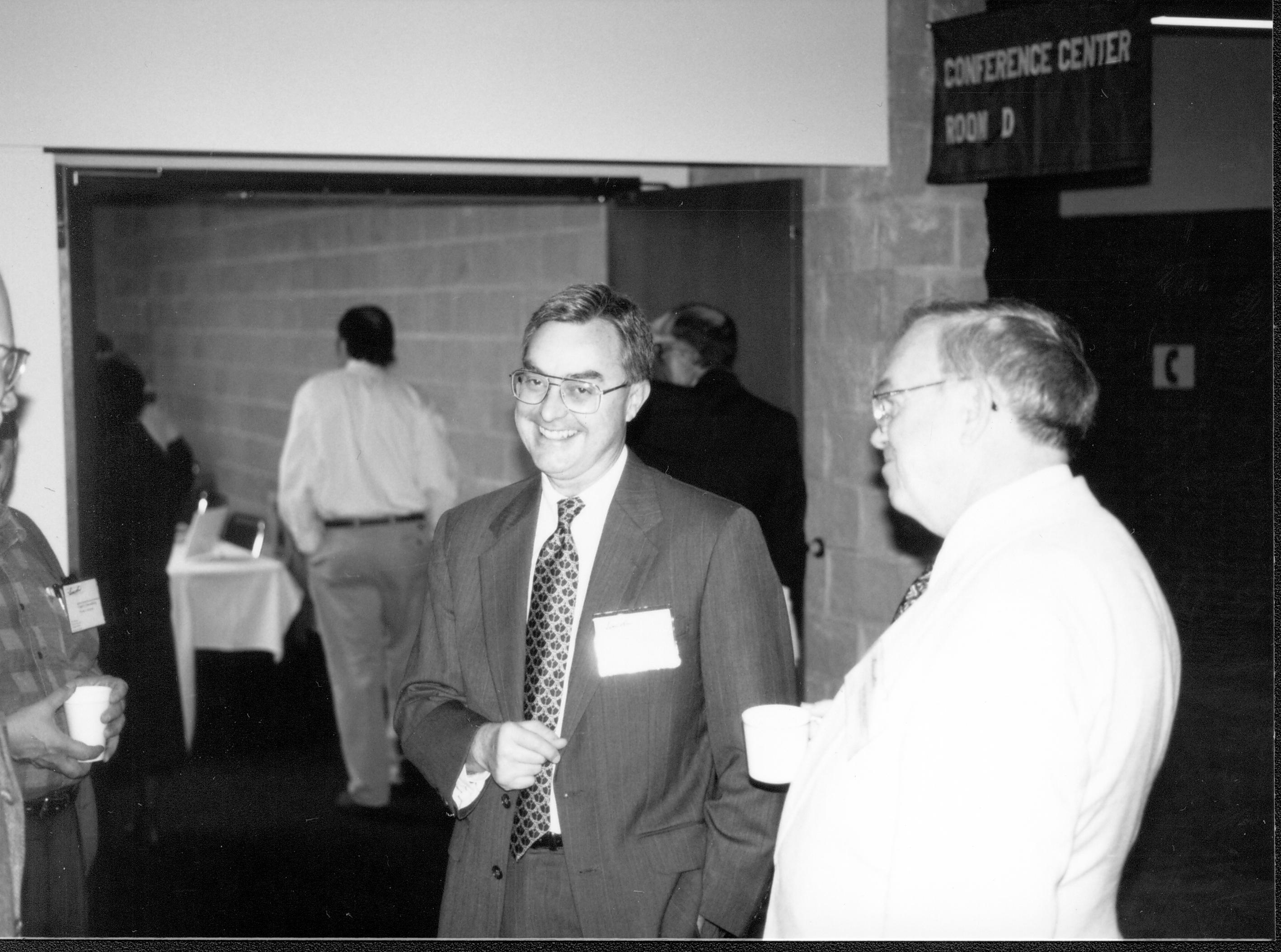 Two men, one smiling.  Lincoln Colloquium; UIS Roll#2, 1of4 Lincoln, Colloquium