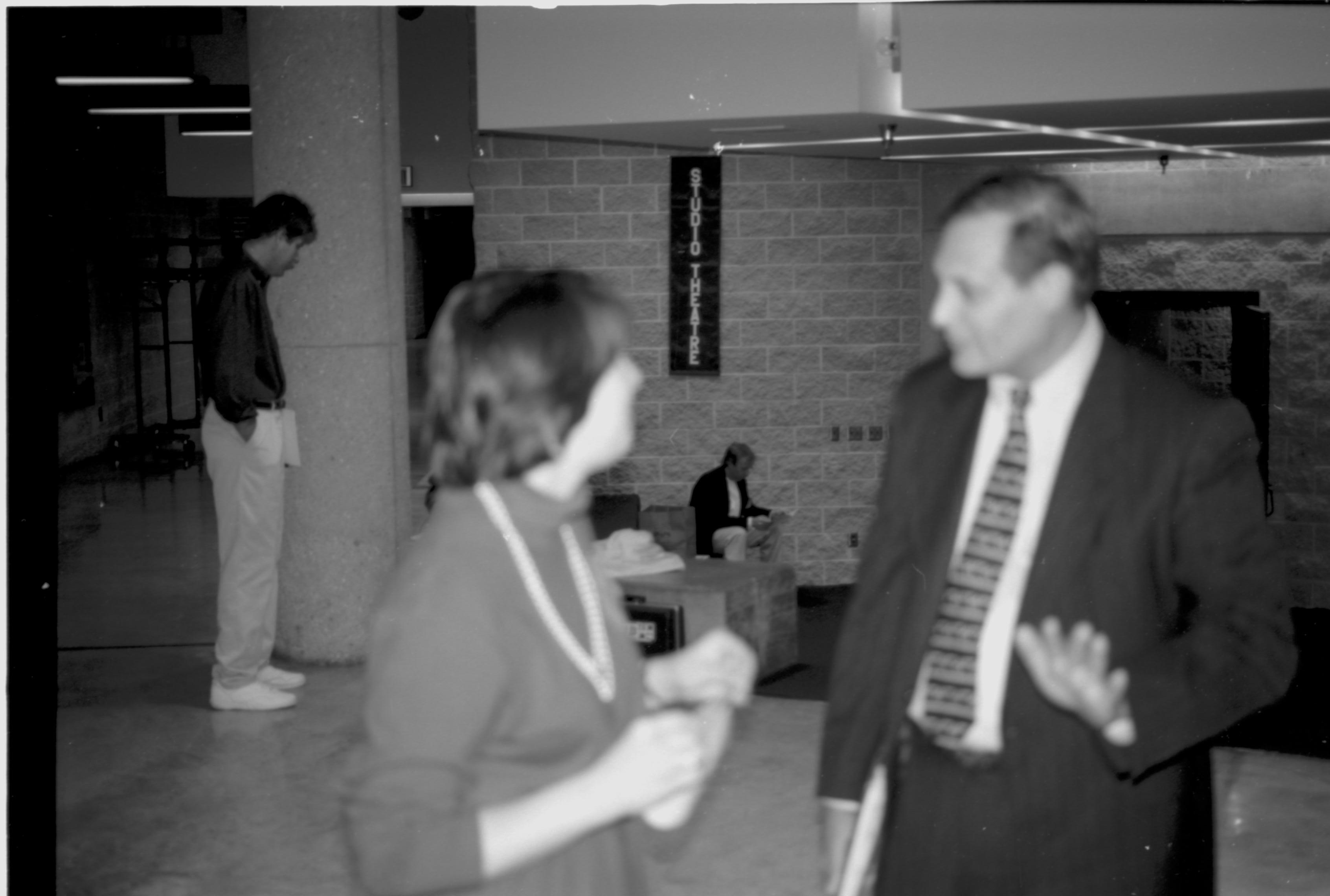 Lady and man talking. Lincoln Colloquium; UIS Roll#2, 4of4 Lincoln, Colloquium