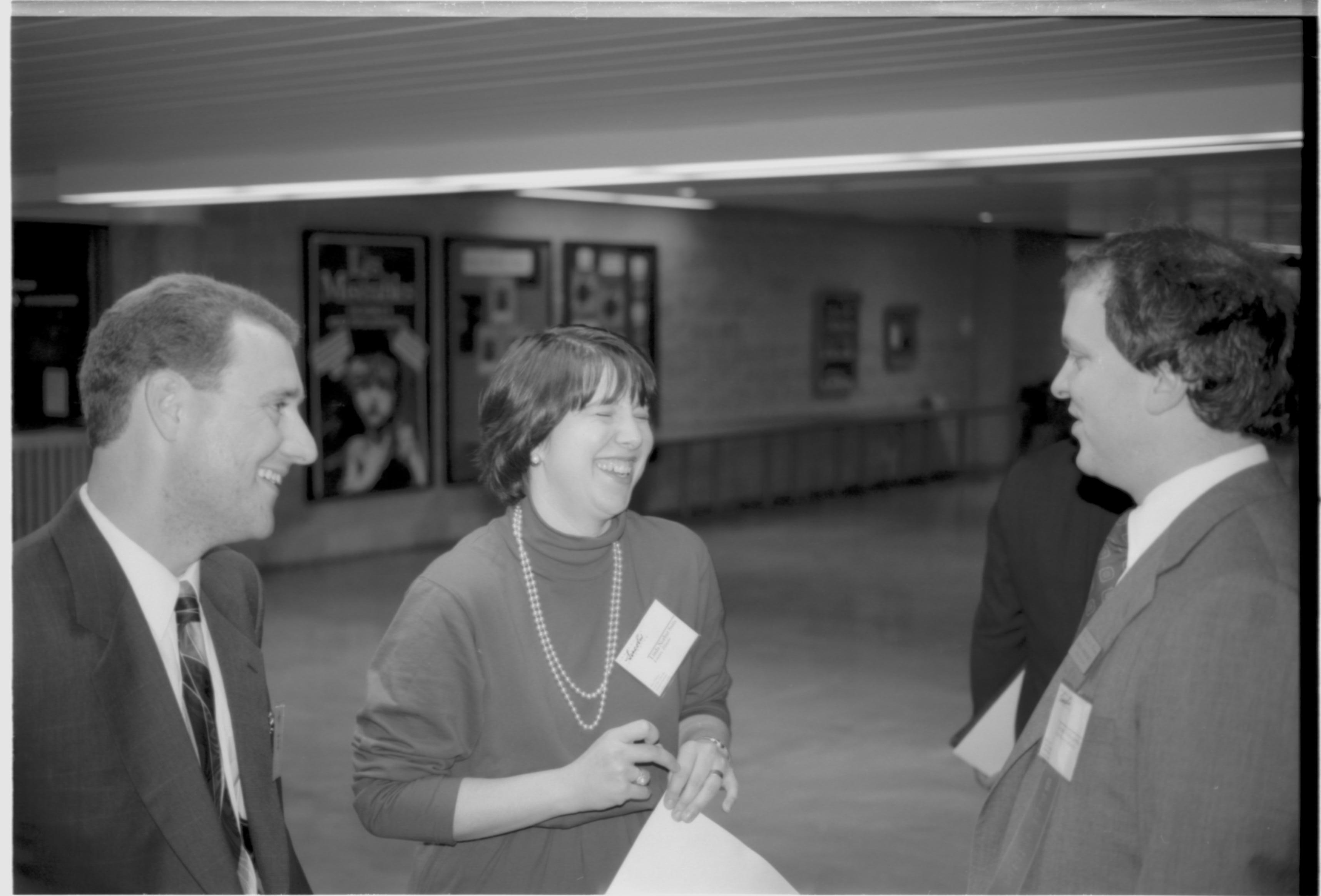 Two men and a lady talking. Lincoln Colloquium; UIS Roll#2, 4of4 Lincoln, Colloquium