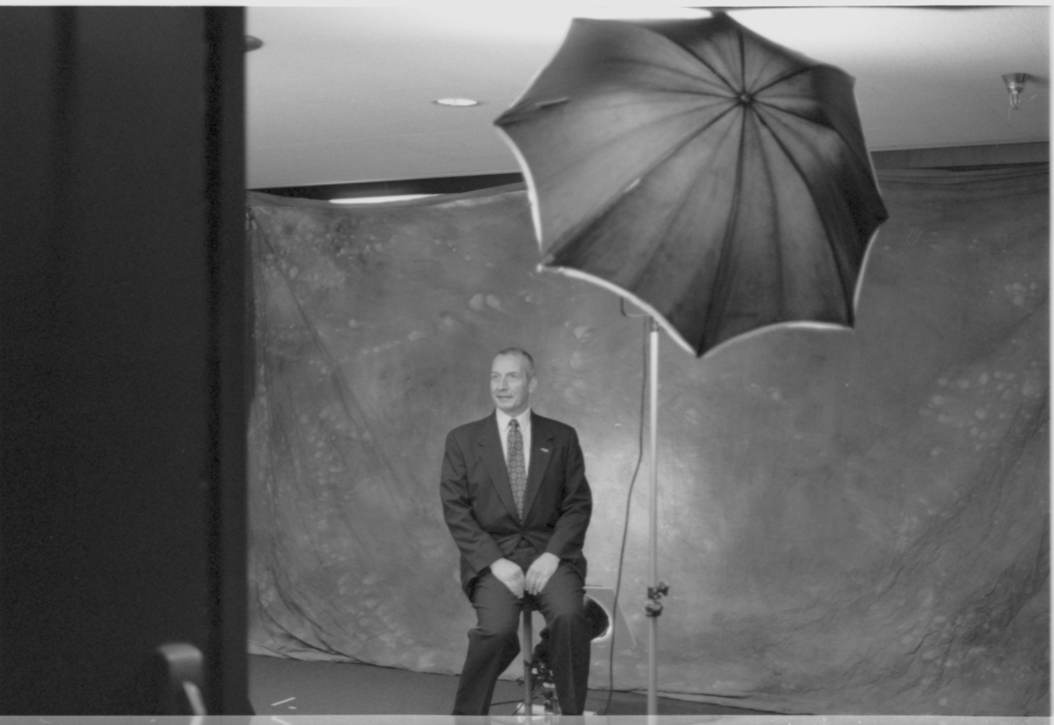 Man seated @ photo session 1-1997 Colloq (b/w) Colloquium, 1997