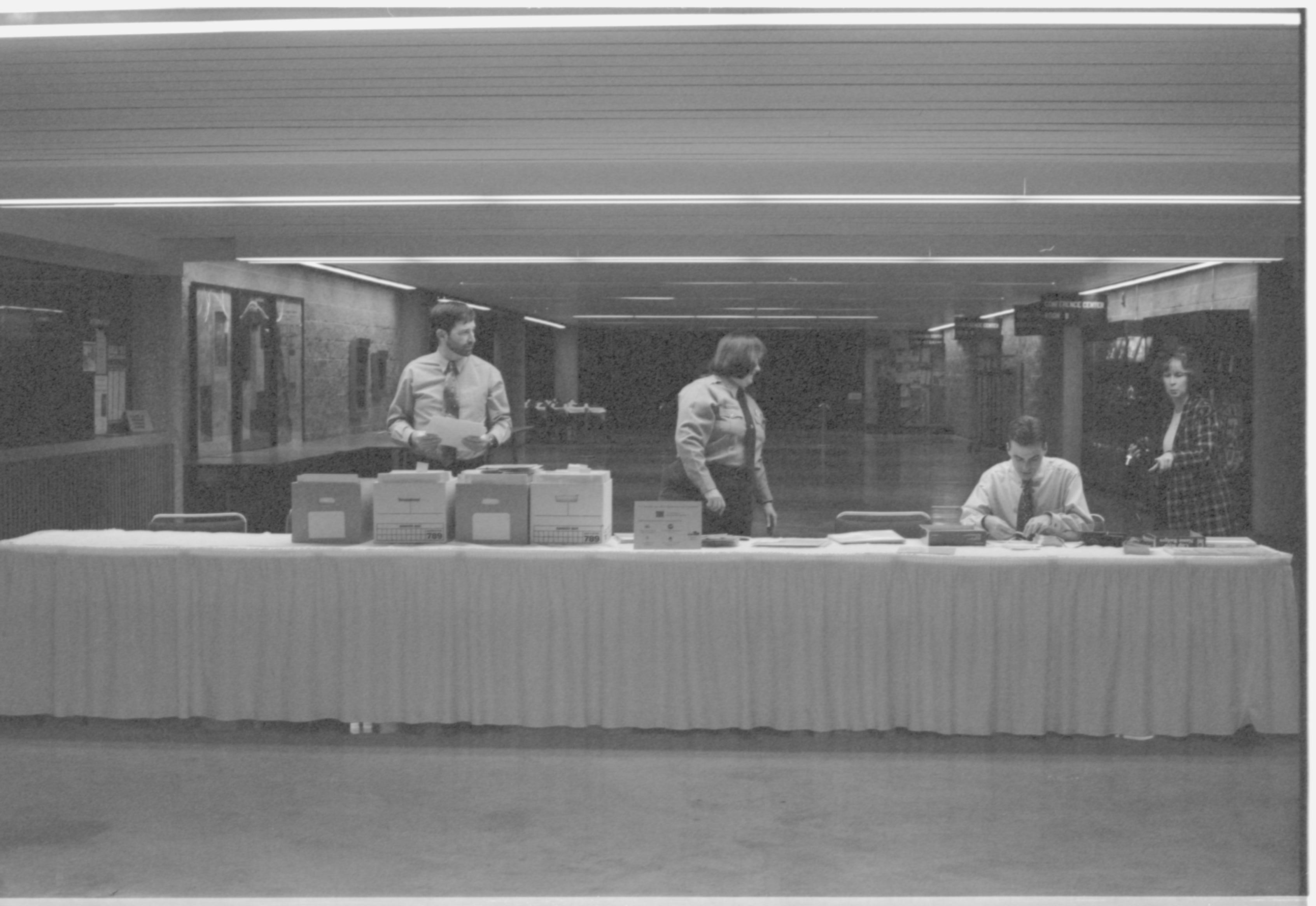 LIHO-NHS staff preparing check-in table 2-1997 Colloq (b/w) Colloquium, 1997