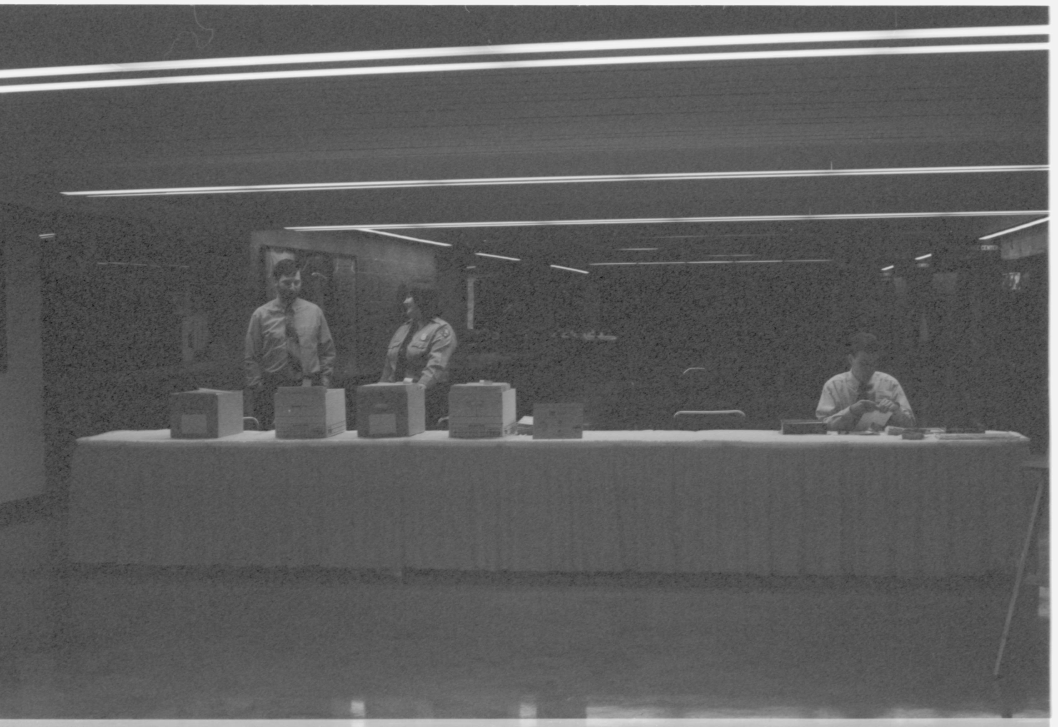 LIHO-NHS staff preparing check-in table 2-1997 Colloq (b/w) Colloquium, 1997