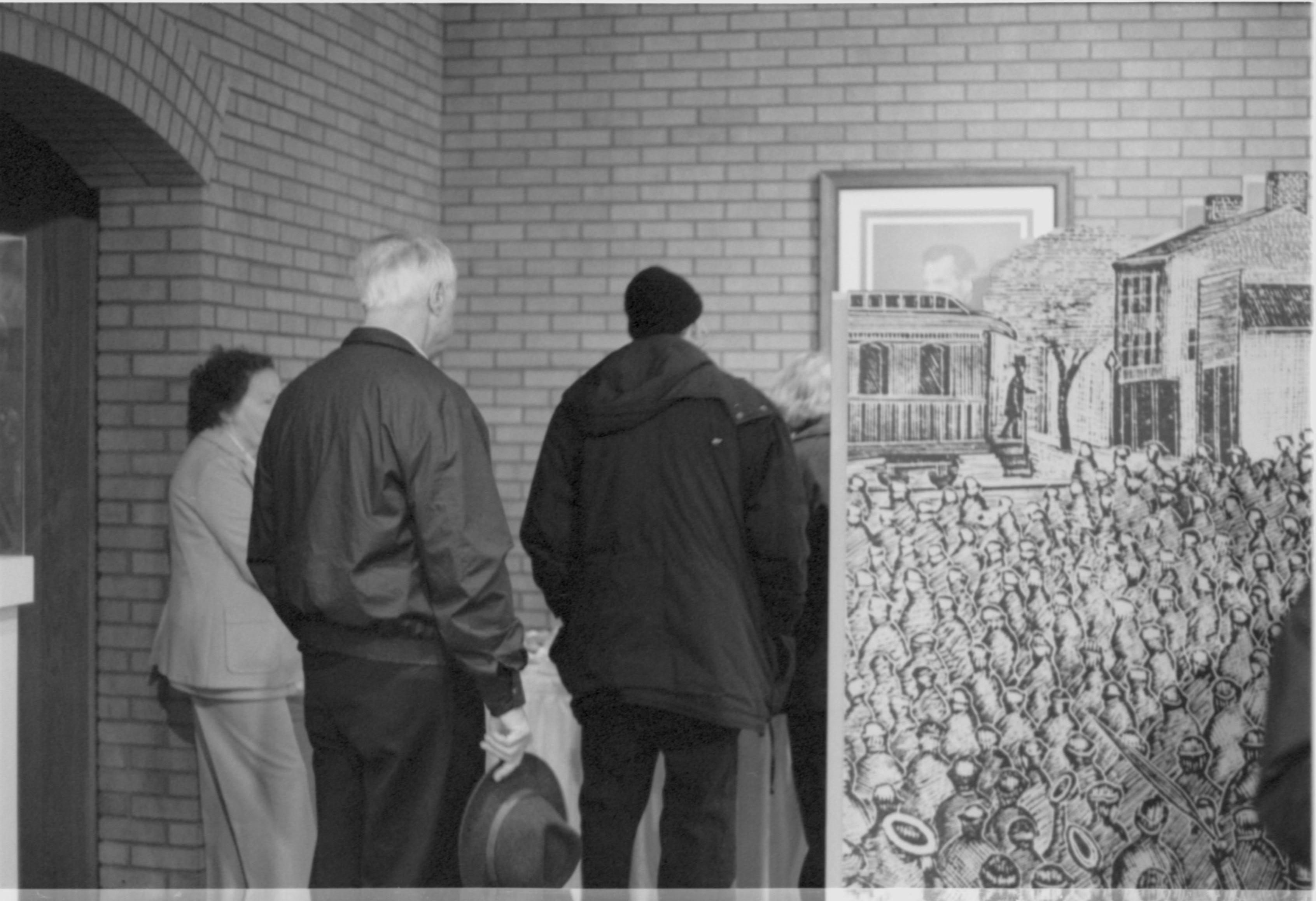 Guests looking at art work in VC.  3-1997 Colloq (b/w); 14 Colloquium, 1997