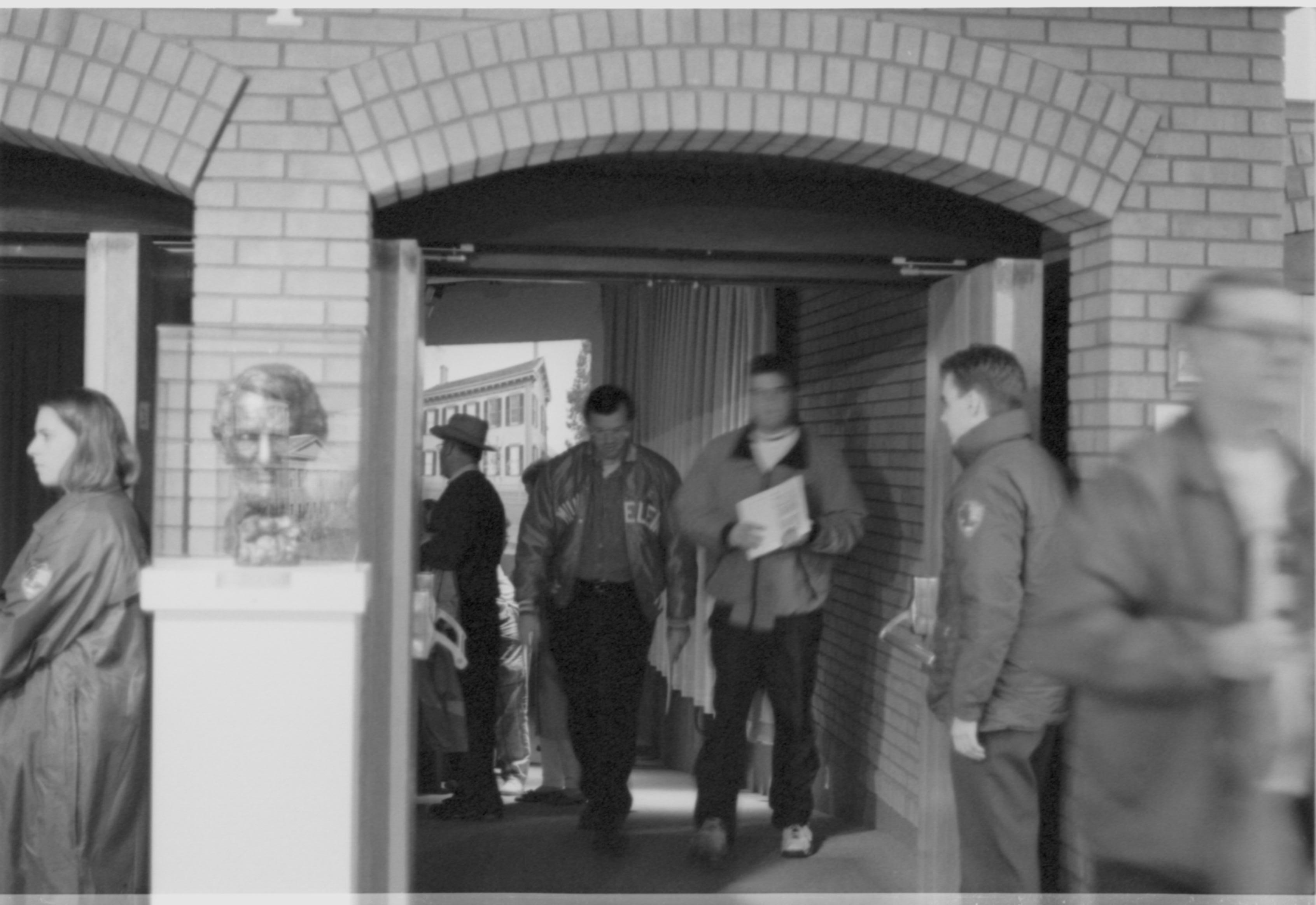 People exiting theater I. 3-1997 Colloq (b/w); 24 Colloquium, 1997