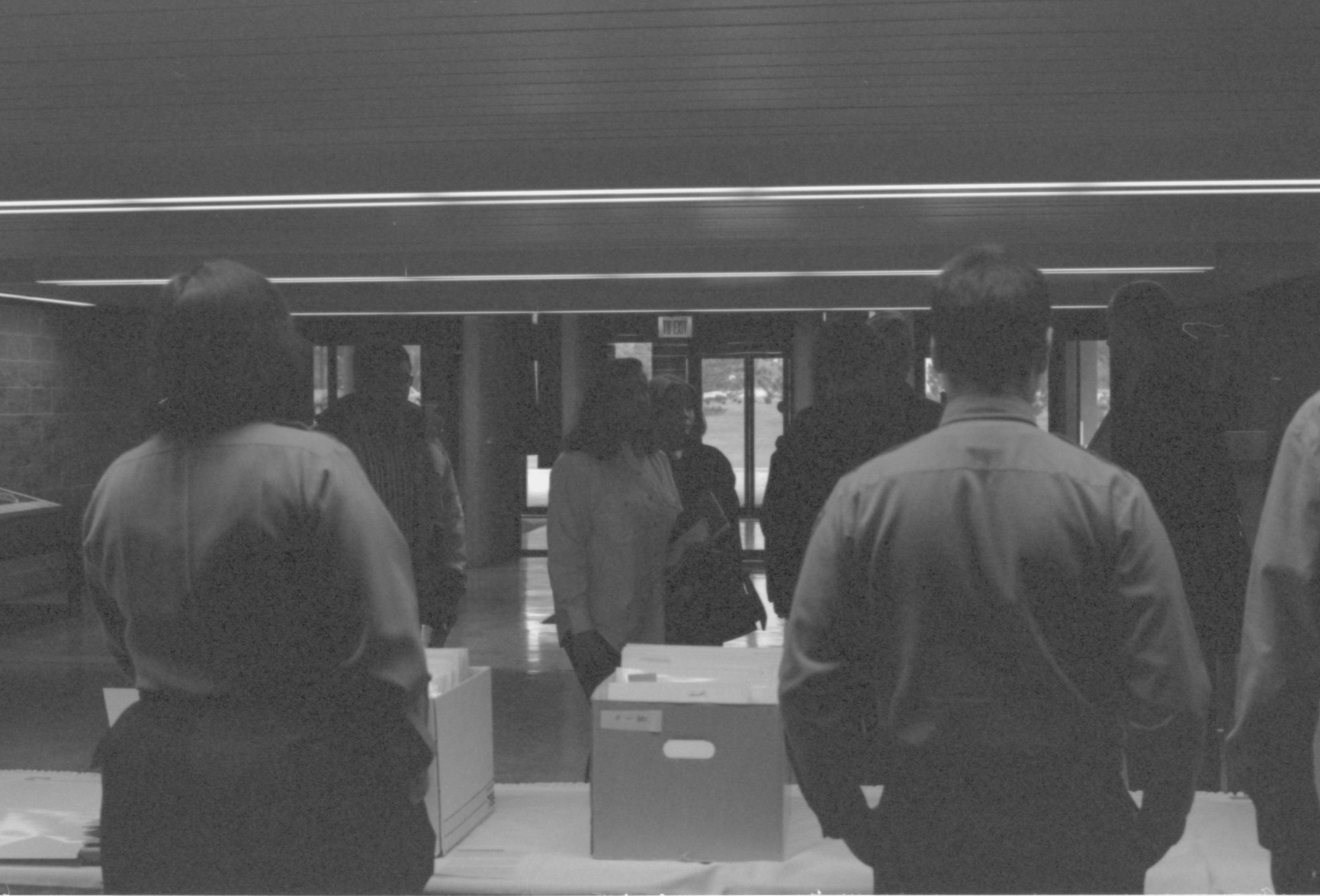 Arrival of HS students - check-in table. 1-1997 Colloq (b/w) Colloquium, 1997