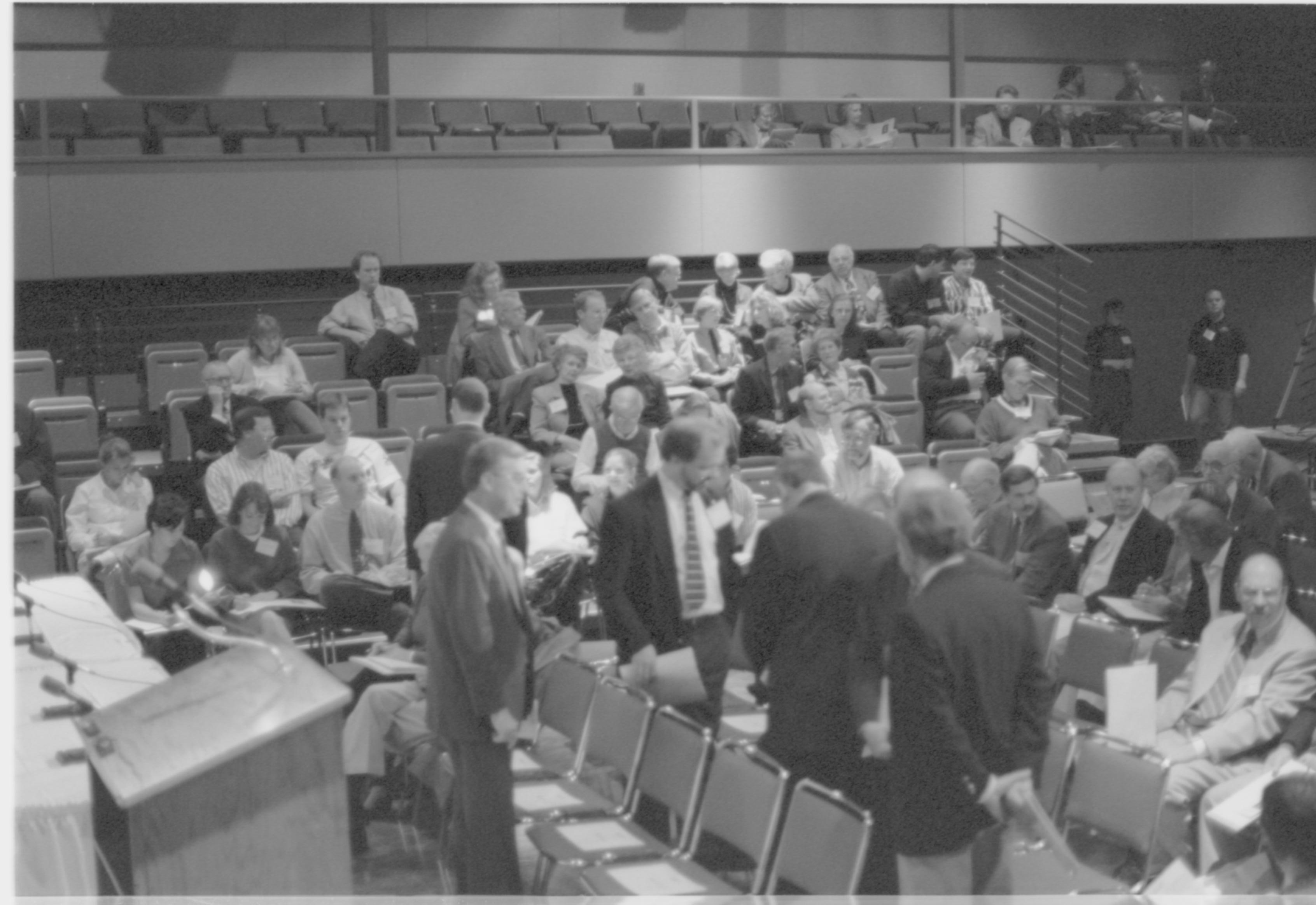 Norm Hellmers in Lecture Hall with speakers 4-1997 Colloq (b/w); 15 Colloquium, 1997