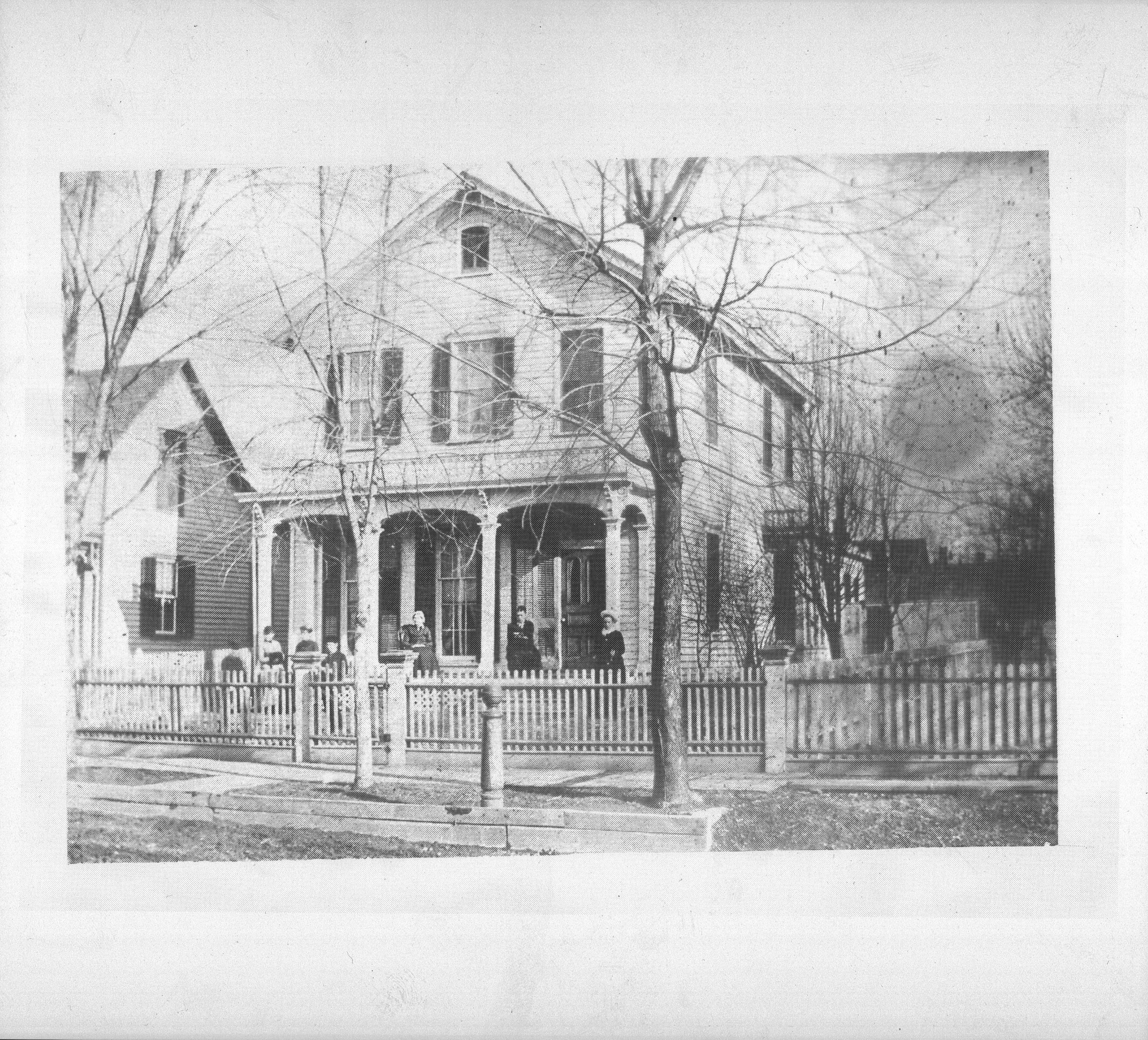 People in front of house Robinson house, South Eighth street. Portraits, Robinson