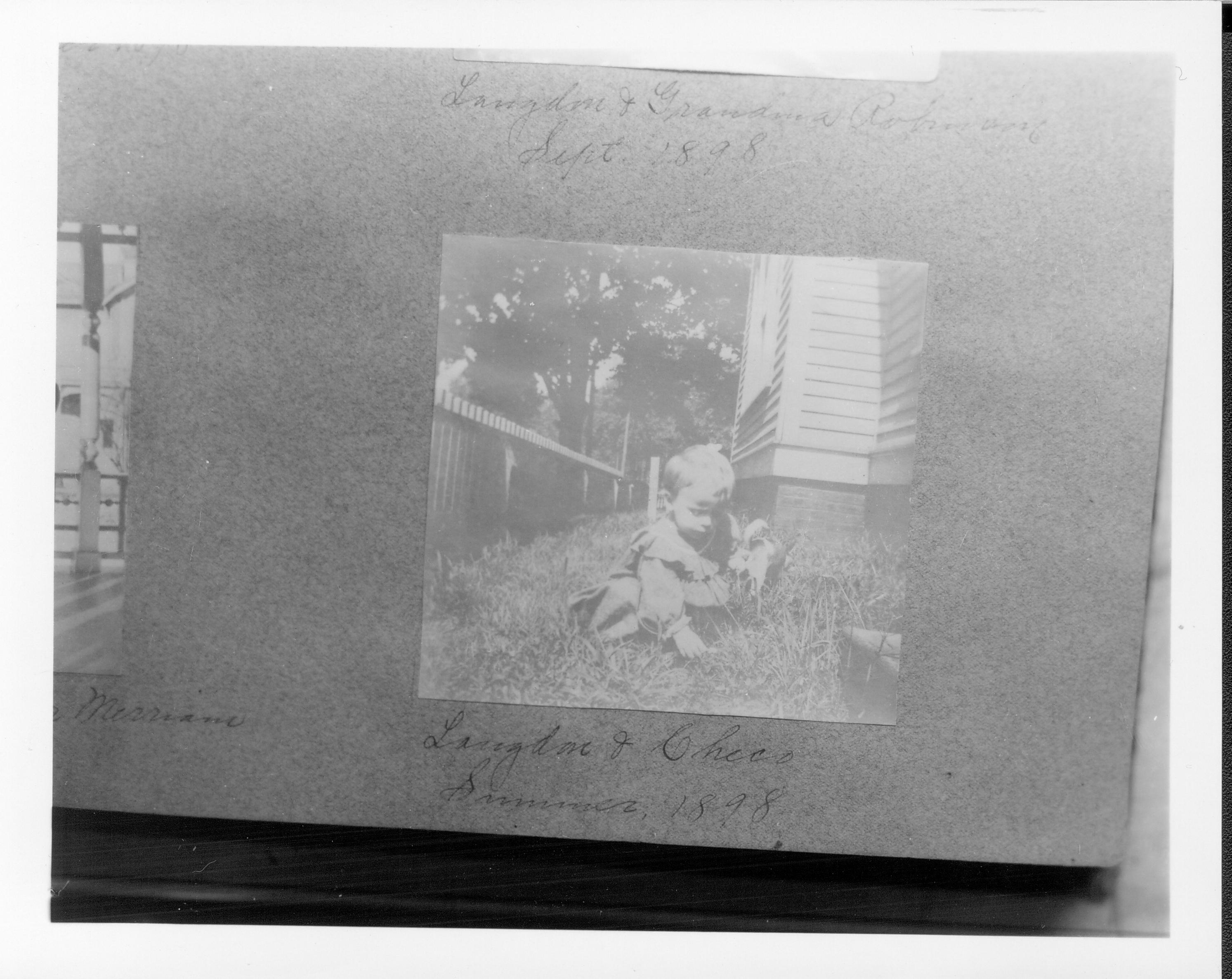 Little boy with dog in yard. Class 1, Pic 5 Portraits, Robinson