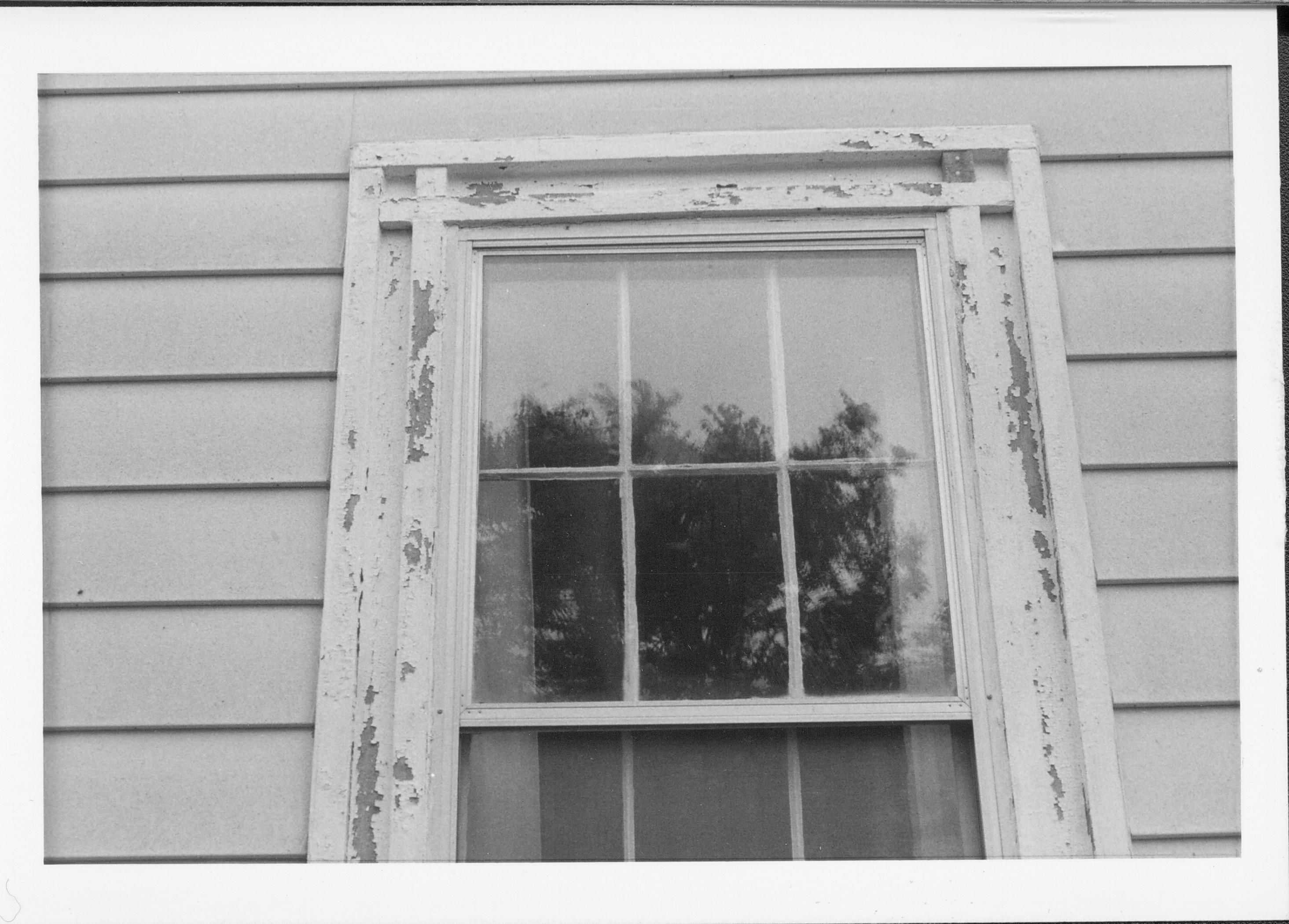 View of window with peeling paint. Gardner-McMillan