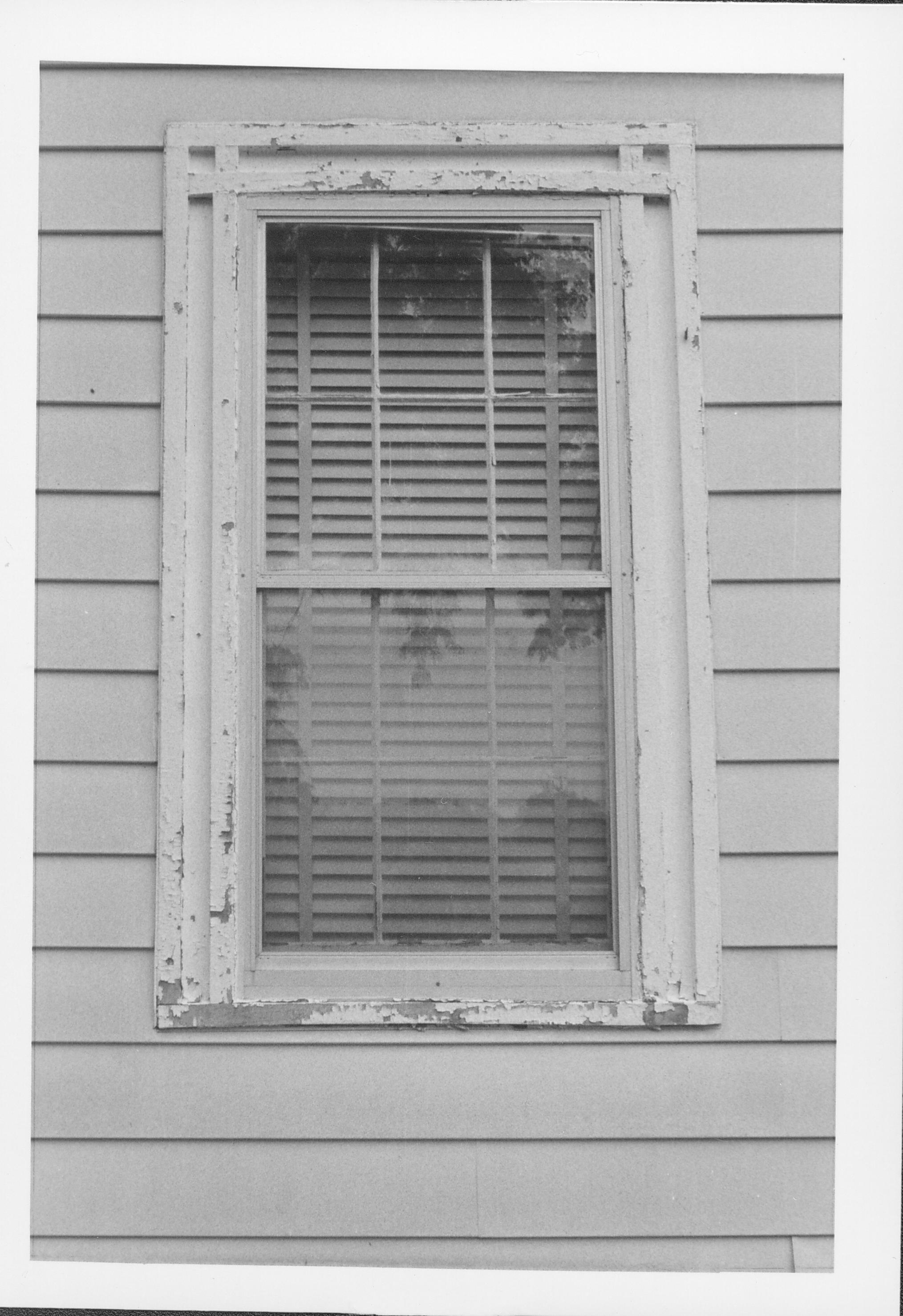 View of window with peeling paint. Gardner-McMillan