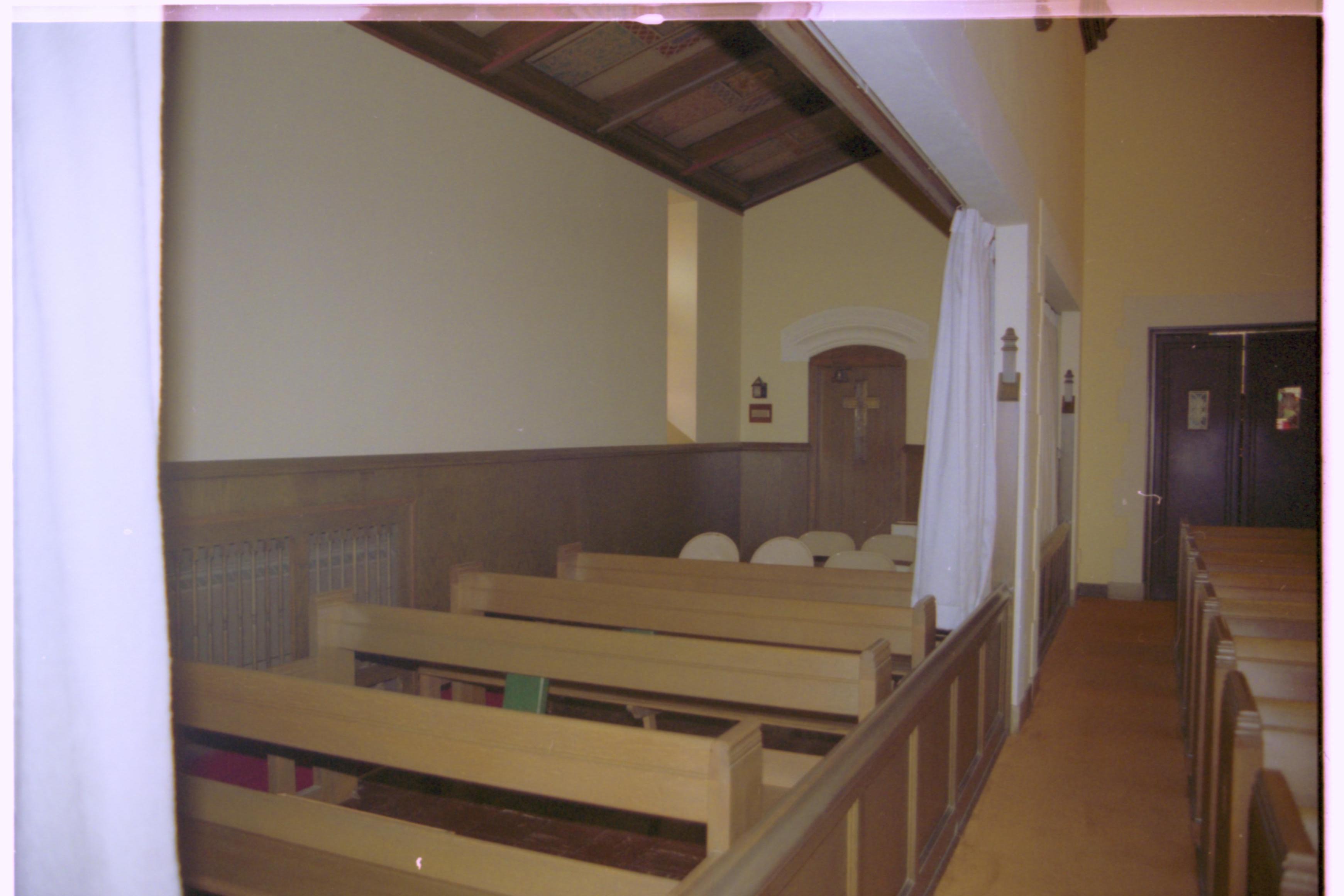 Pews, chairs in small worship area. Grace Lutheran Church