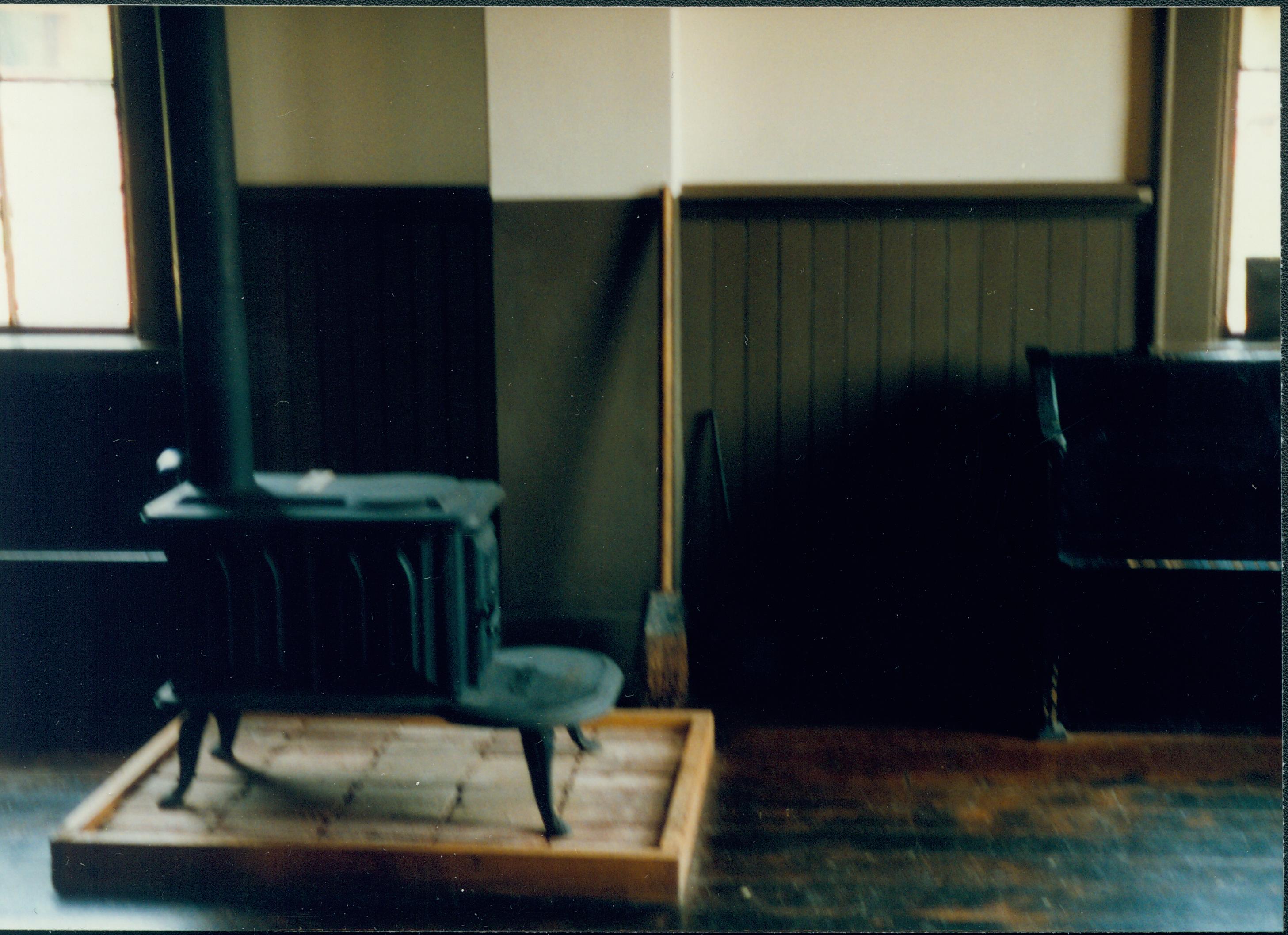 Iron stove and bench. Great Western Depot, Train Station