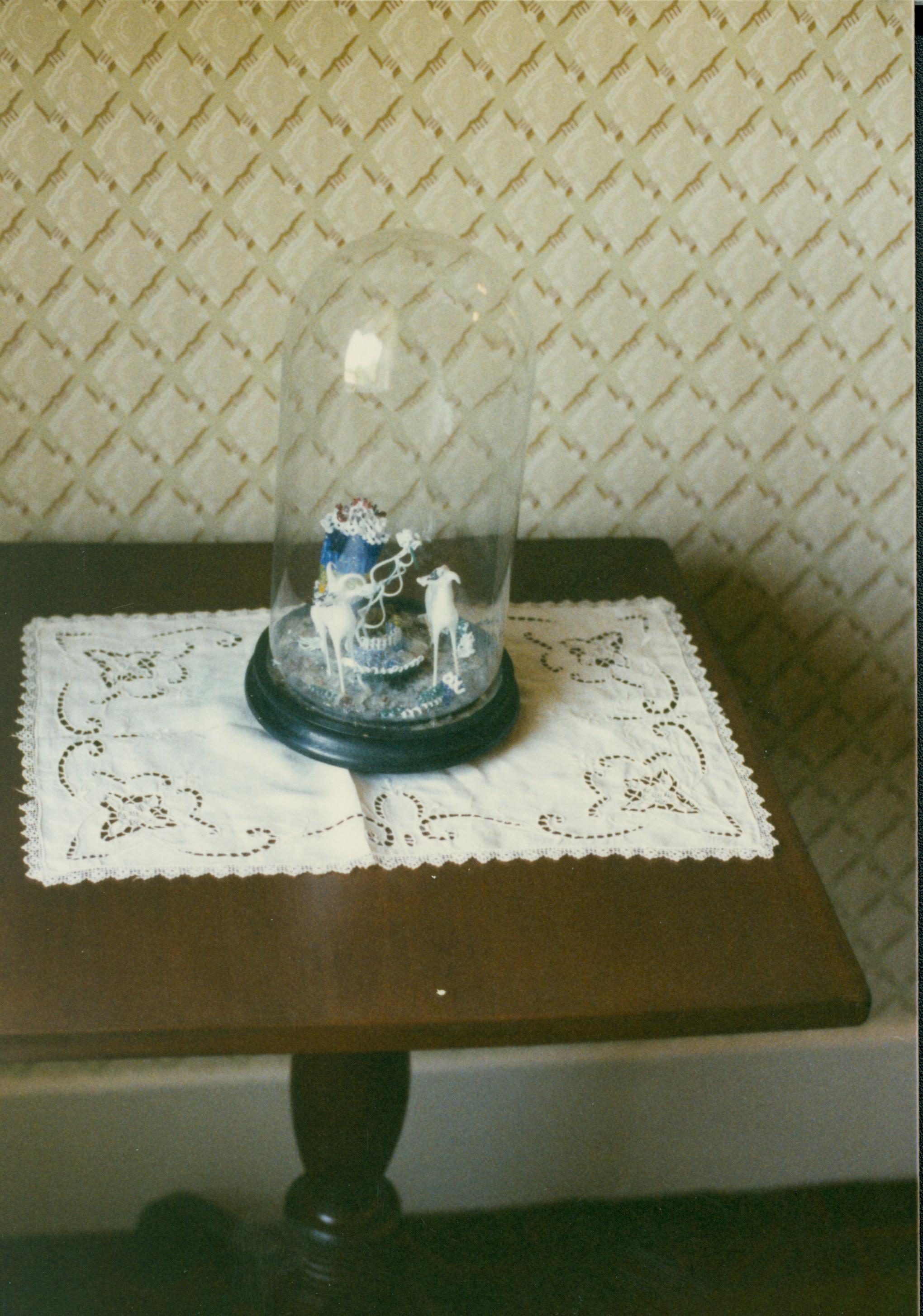 NA #12 Lincoln, Home, stair hall, figurine under glass, table