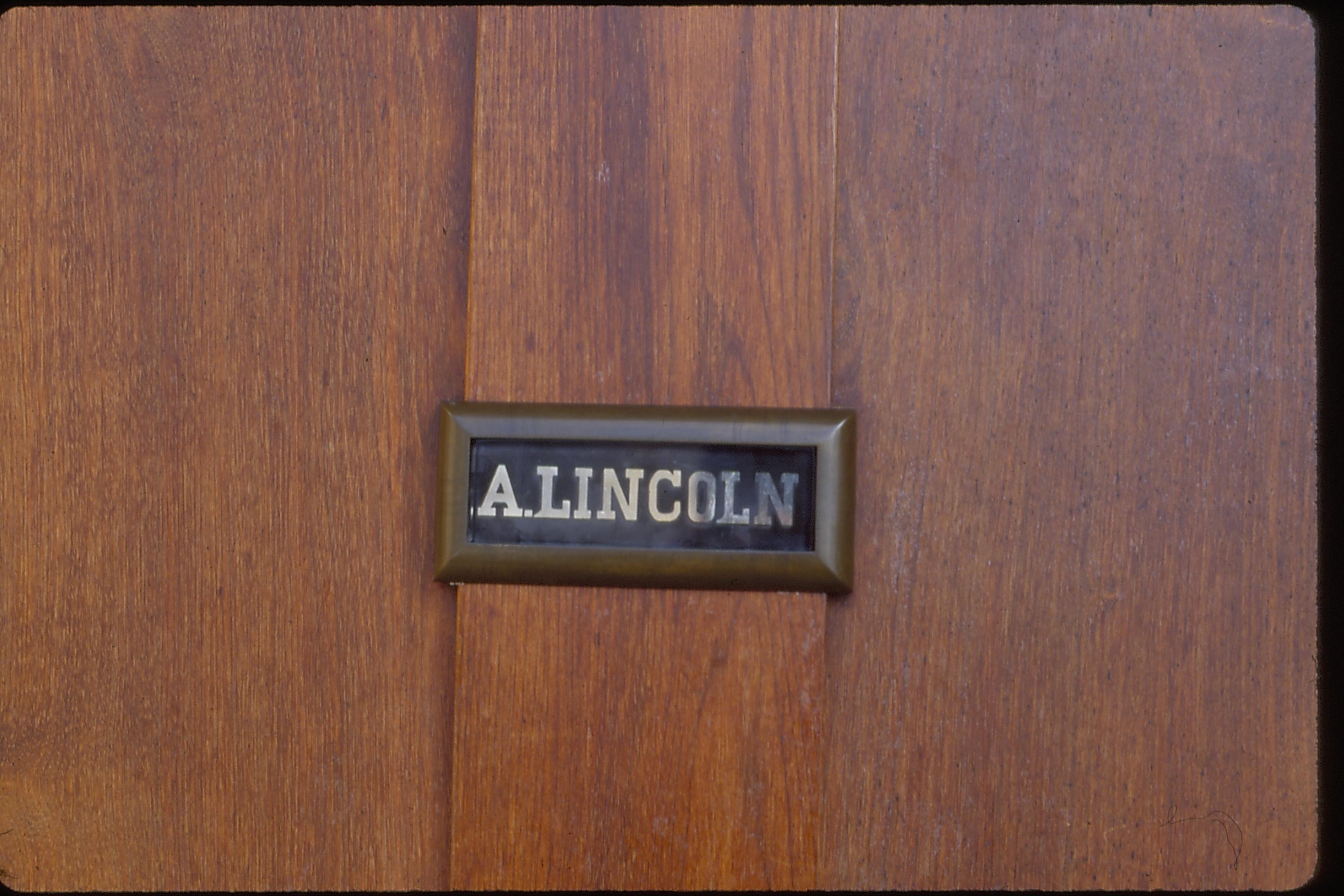 Reproduced "A. Lincoln" nameplate on Lincoln Home front door, reverse painted on glass