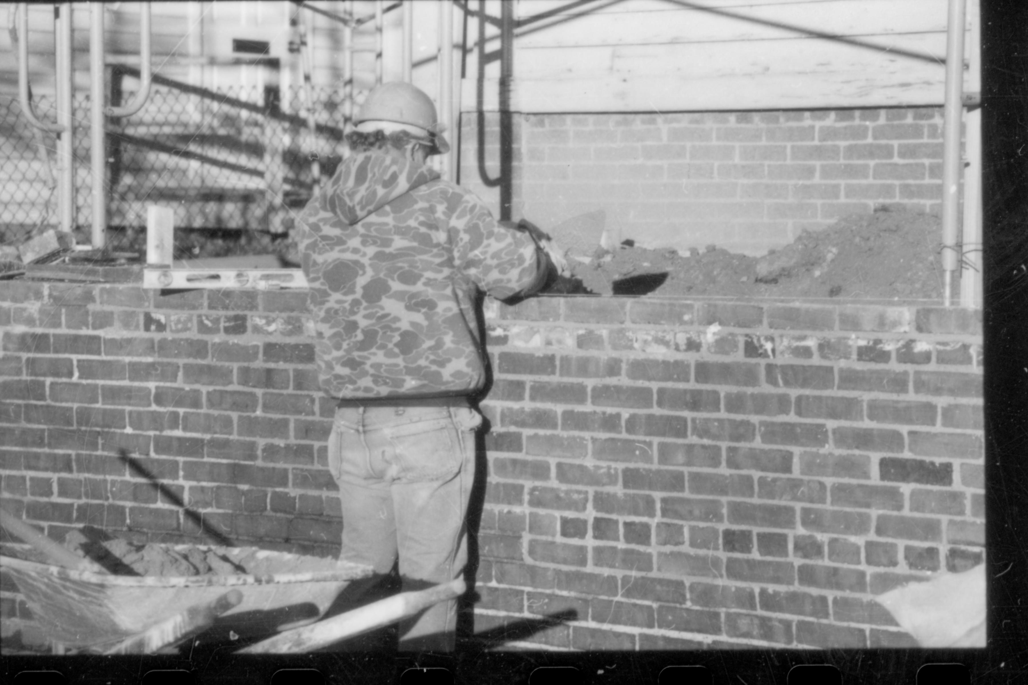 NA Lincoln Home, Restoration, worker, brick, wall