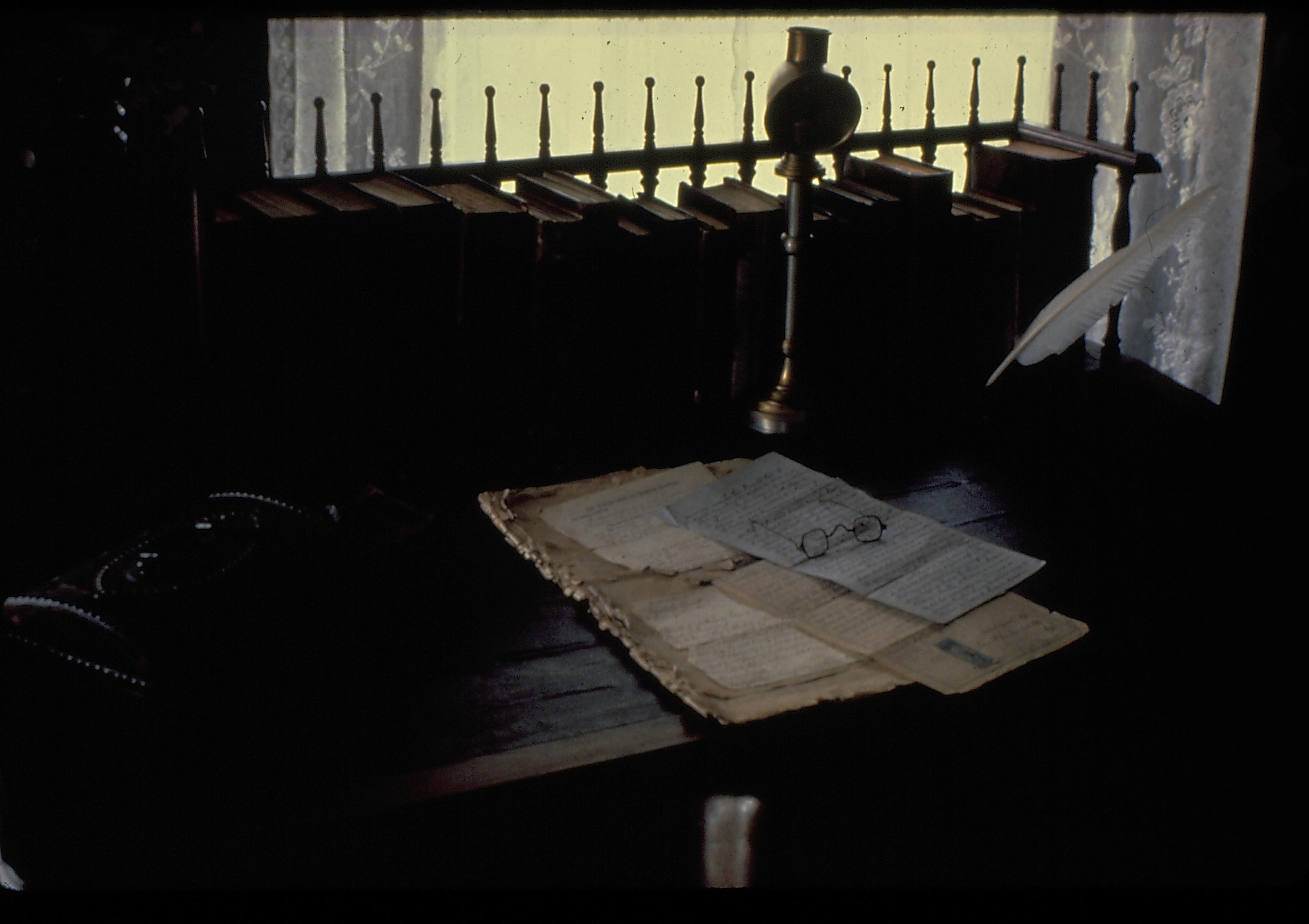 Lincoln's Bedroom 201, 3C.2 Lincoln Home, Bedroom, spindle table, documents, quill pen, books