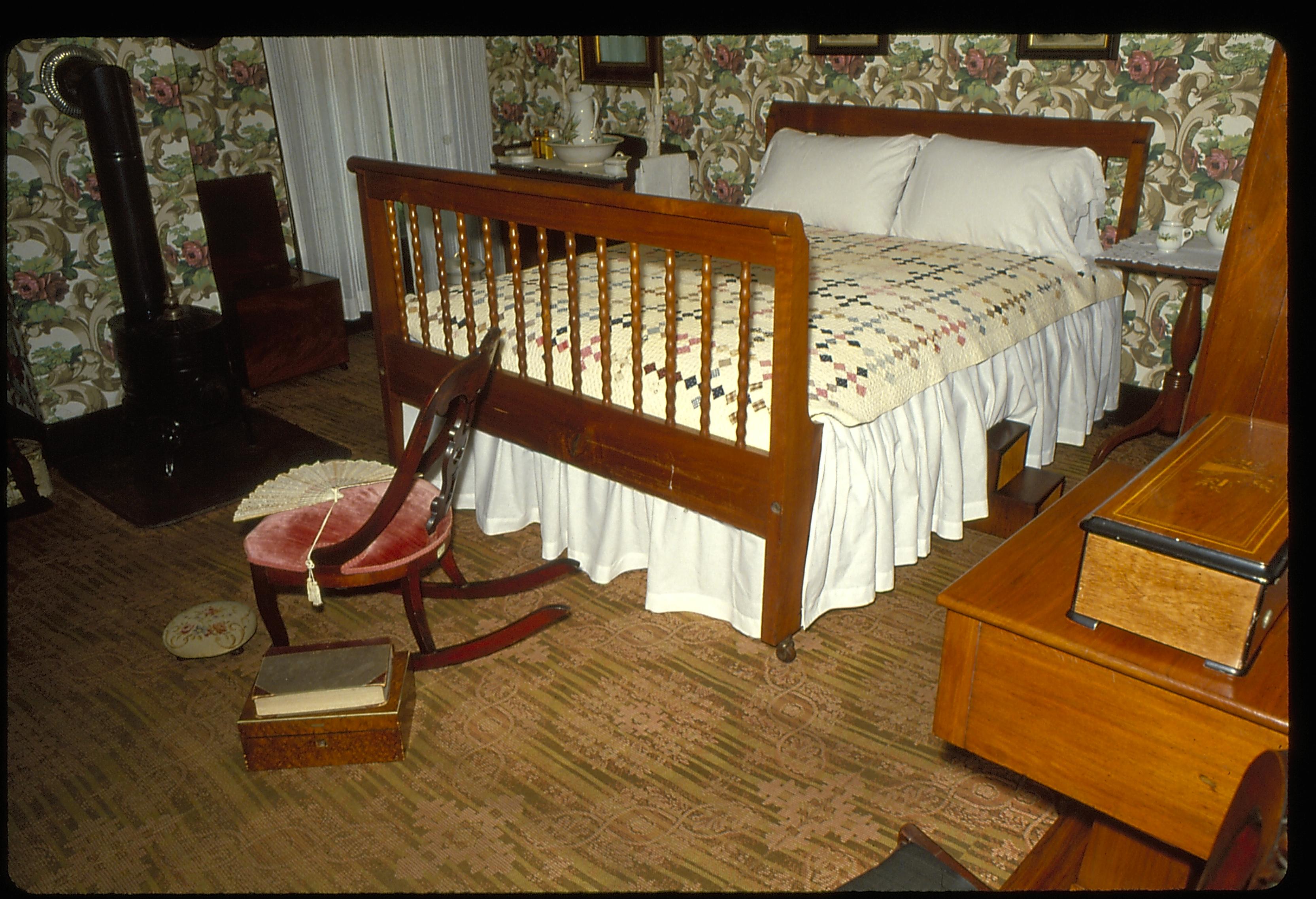 A.29.a. 4; 202 Mary's Bedroom, bed, rocking chair, furnishings