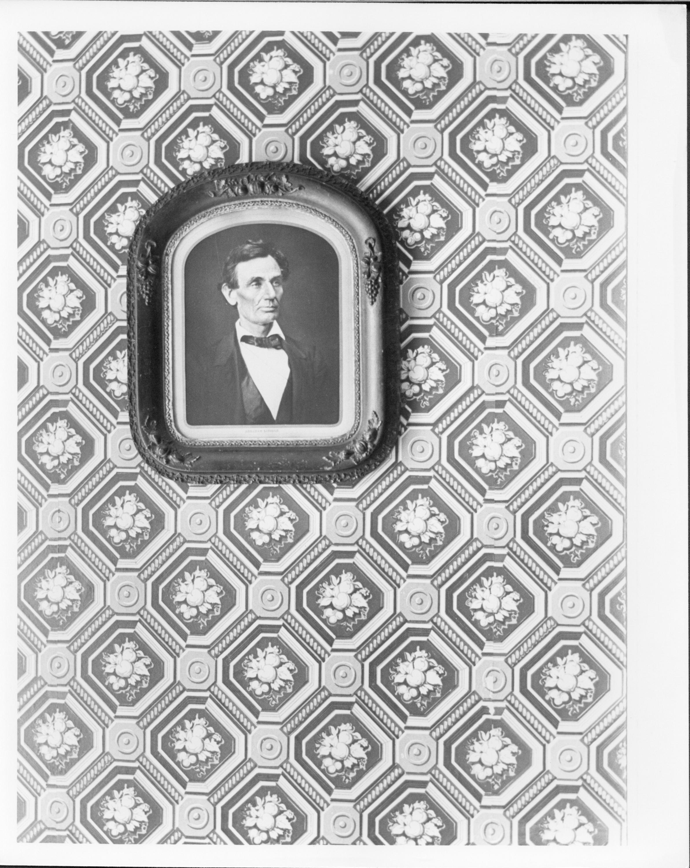 Abraham Lincoln photograph (reprint) in frame in Lincoln Home Front Hall. Photo based on image by Alexander Hesler taken June 3, 1860 in Springfield.