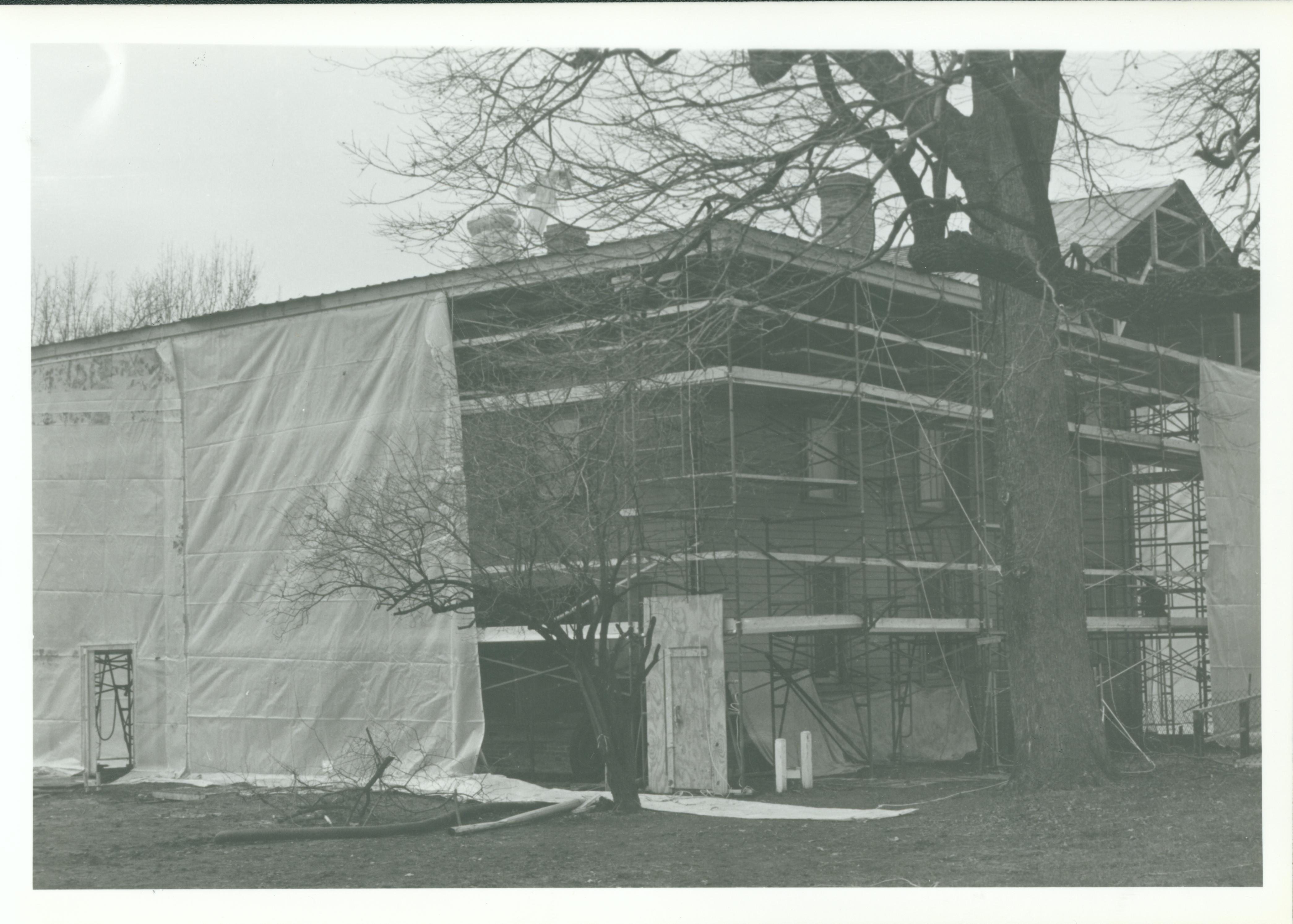 East Side Tent Goes Up - Enclosure panels are being place around the Lincoln Home for the winter season. Scaffolding, which will provide a work platform, is already in place. 14-23 Lincoln, Home, Restoration, covering, tent, east