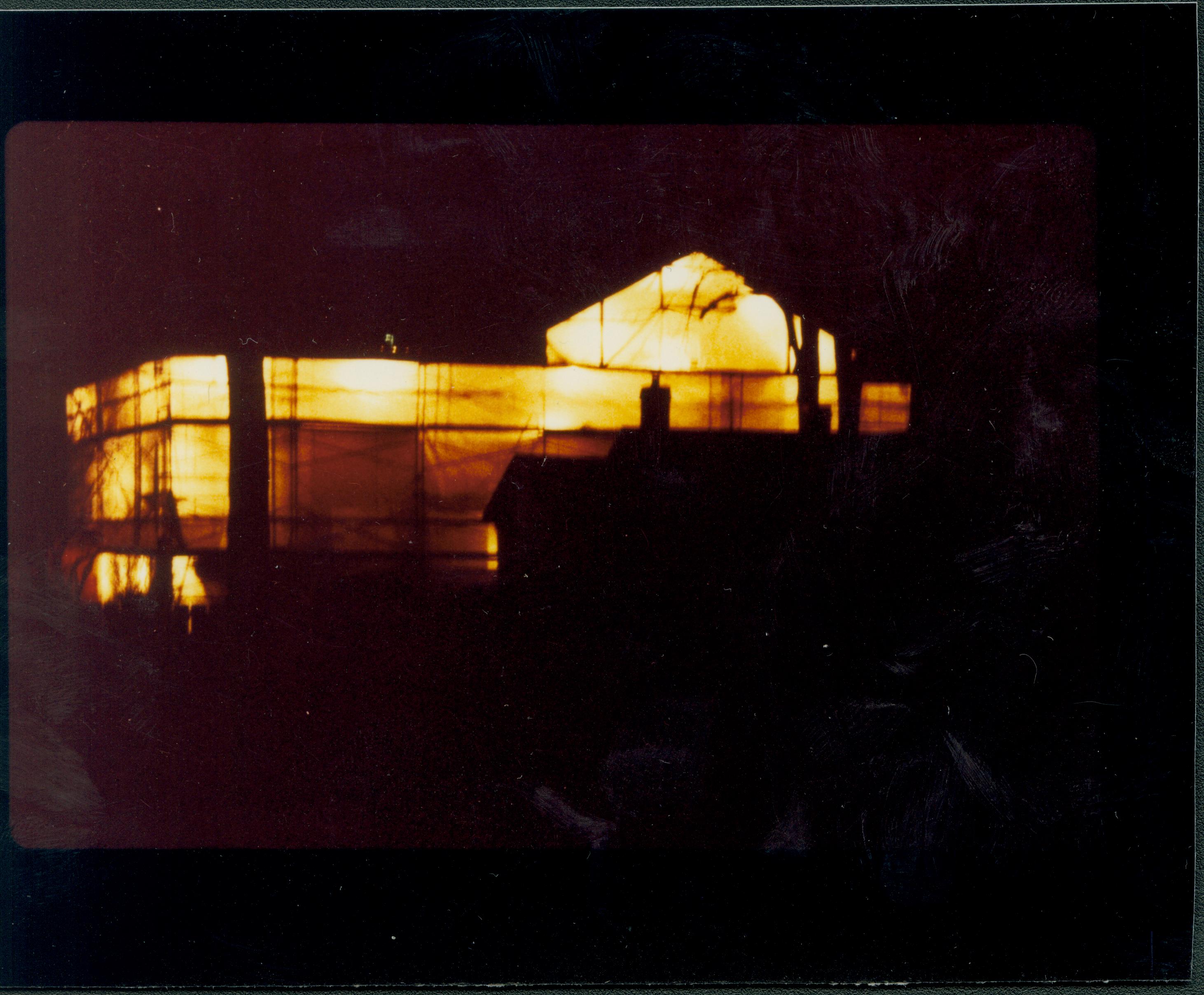 Winter 1987/1988 Home enclosed with plastic to permit work on exterior. Lincoln, home, restoration, tent