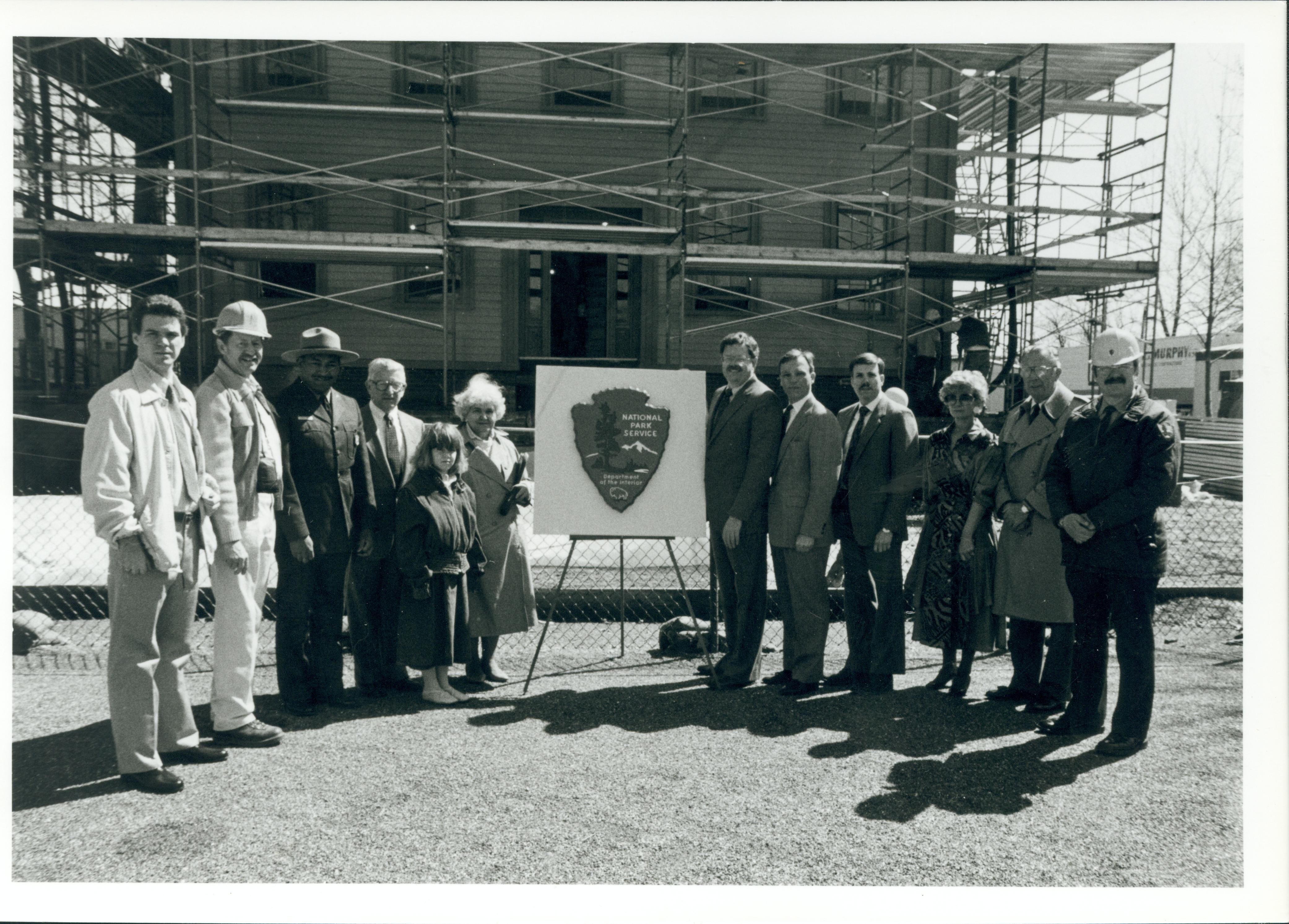 (L-R)Asst. to Proj. Manager, Proj. Manager Vance Comminsky,Gentry Davis-Supt.LIHO, Mr./Mrs.Ossie Langfelder (and daughter)-Mayor of Springfield,Mike Devine-Dir.IPHA,Mike Daley-Admin.Asst. to Congressman Durbin??Jack Clark, publ. State Journal Reg.,George  27 Lincoln, Home, Restoration, staff