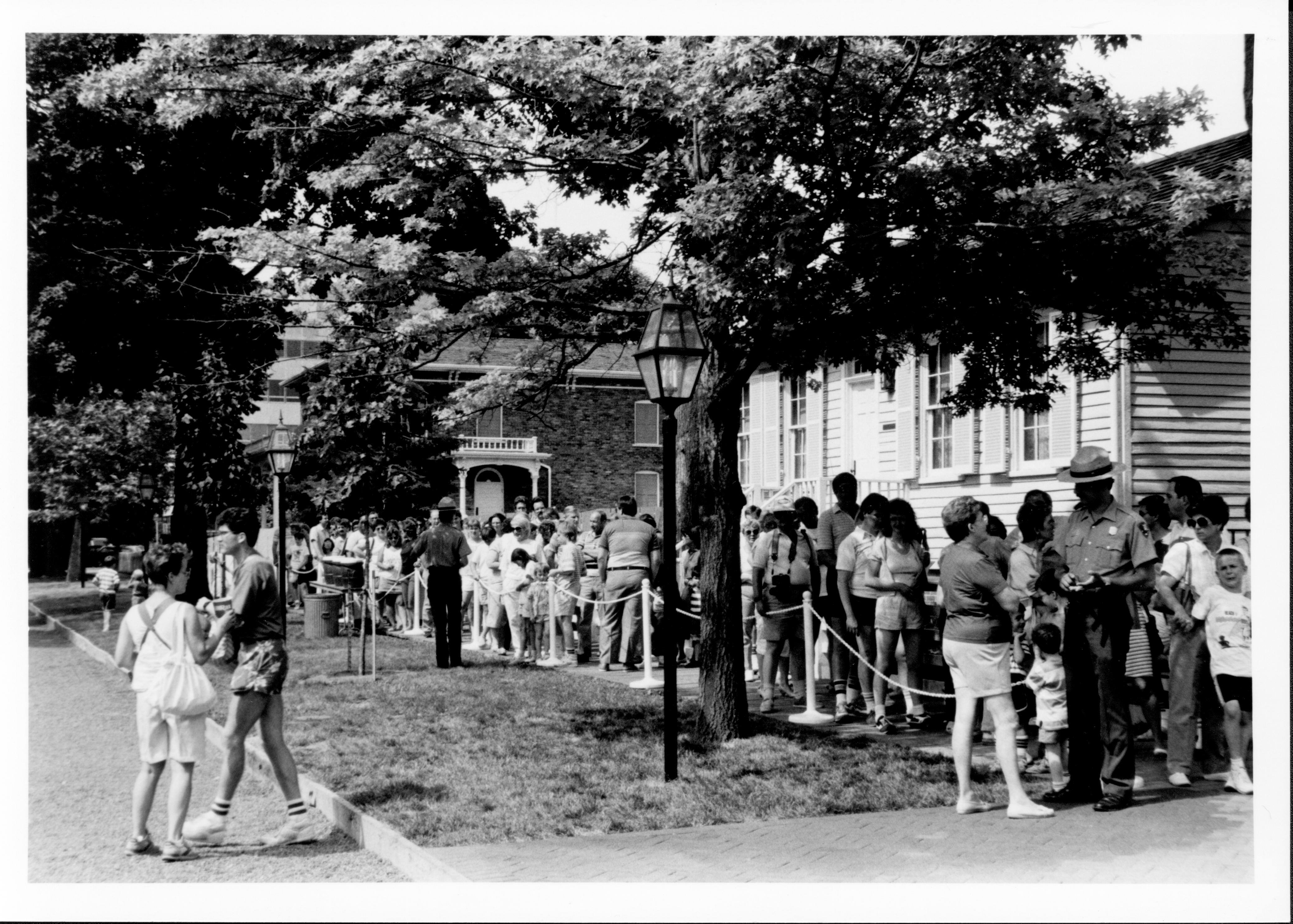 Visitors in line for Lincoln Home - Nick Stavroplus, ranger closest (note water colors for visitors). Lincoln, Home, Restoration, Rededication, Reopening, Visitors, Nick Stavroplus