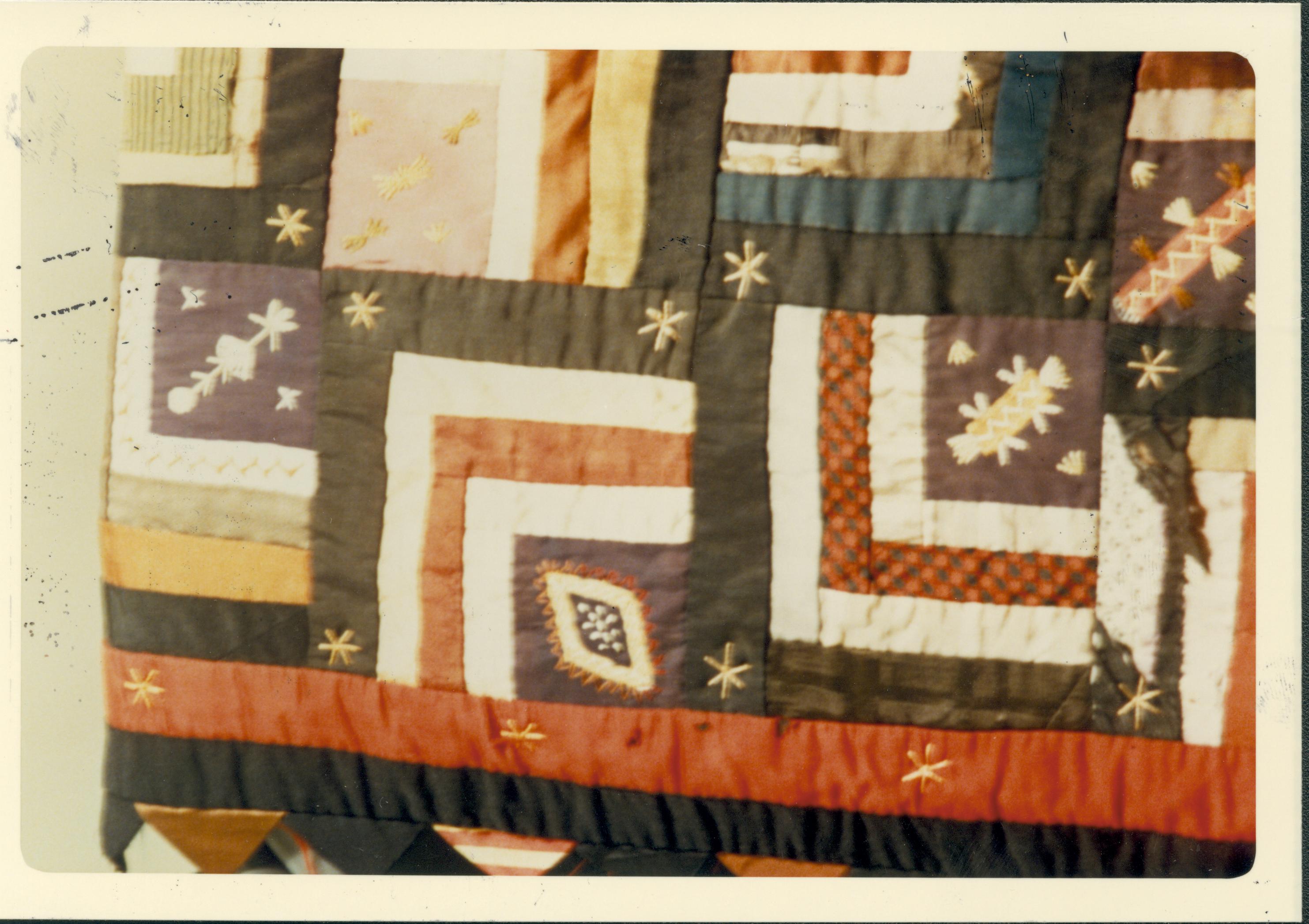 Close up of Log Cabin Quilt with embroidery (#814) (see slide #814) quilt