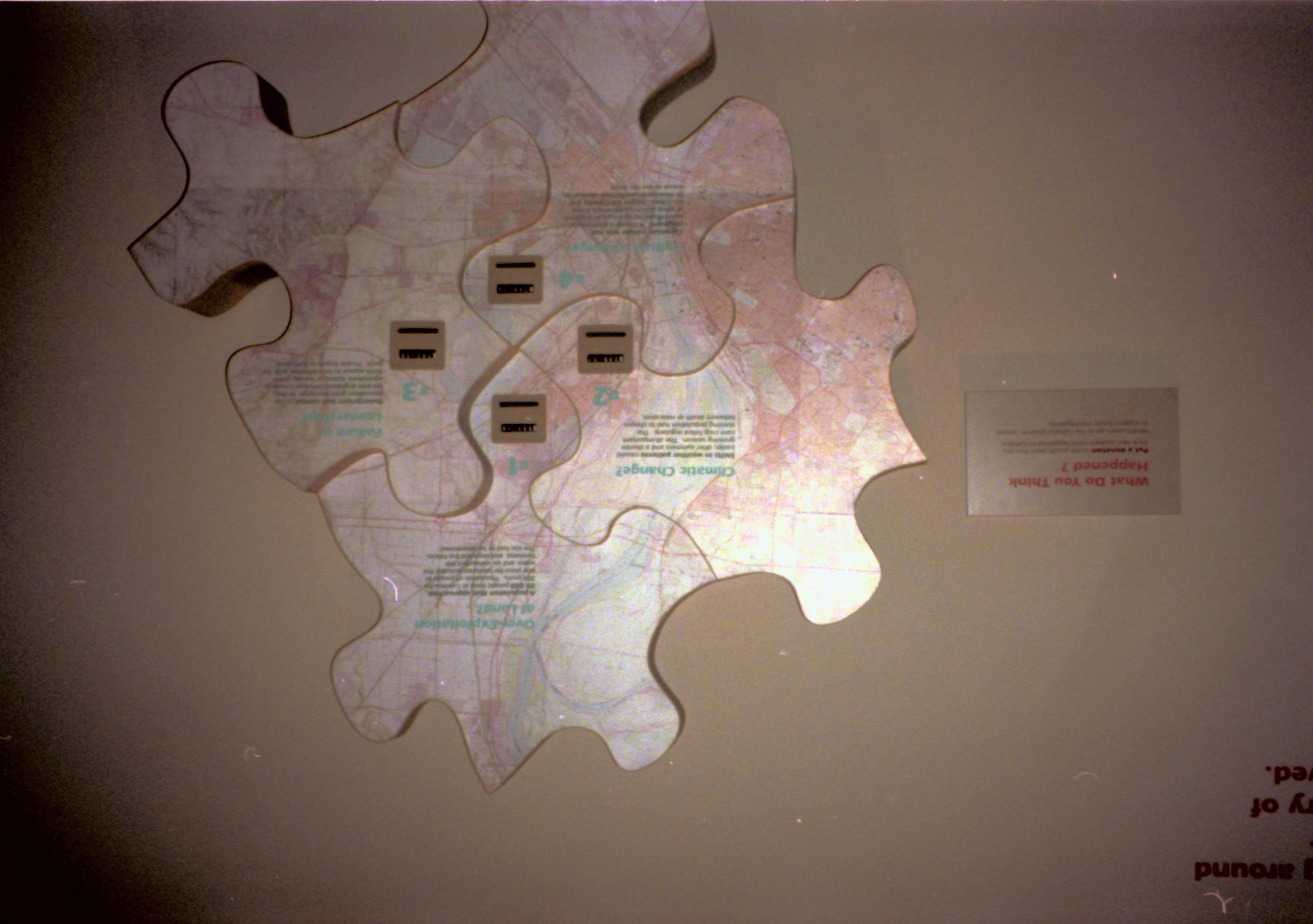 NA neg. sleeve(LIHO Door, Clock, Cahokia Mnds., Natl Portrait Gallery) Lincoln, artifacts, Cahokia, map, puzzle, climate change