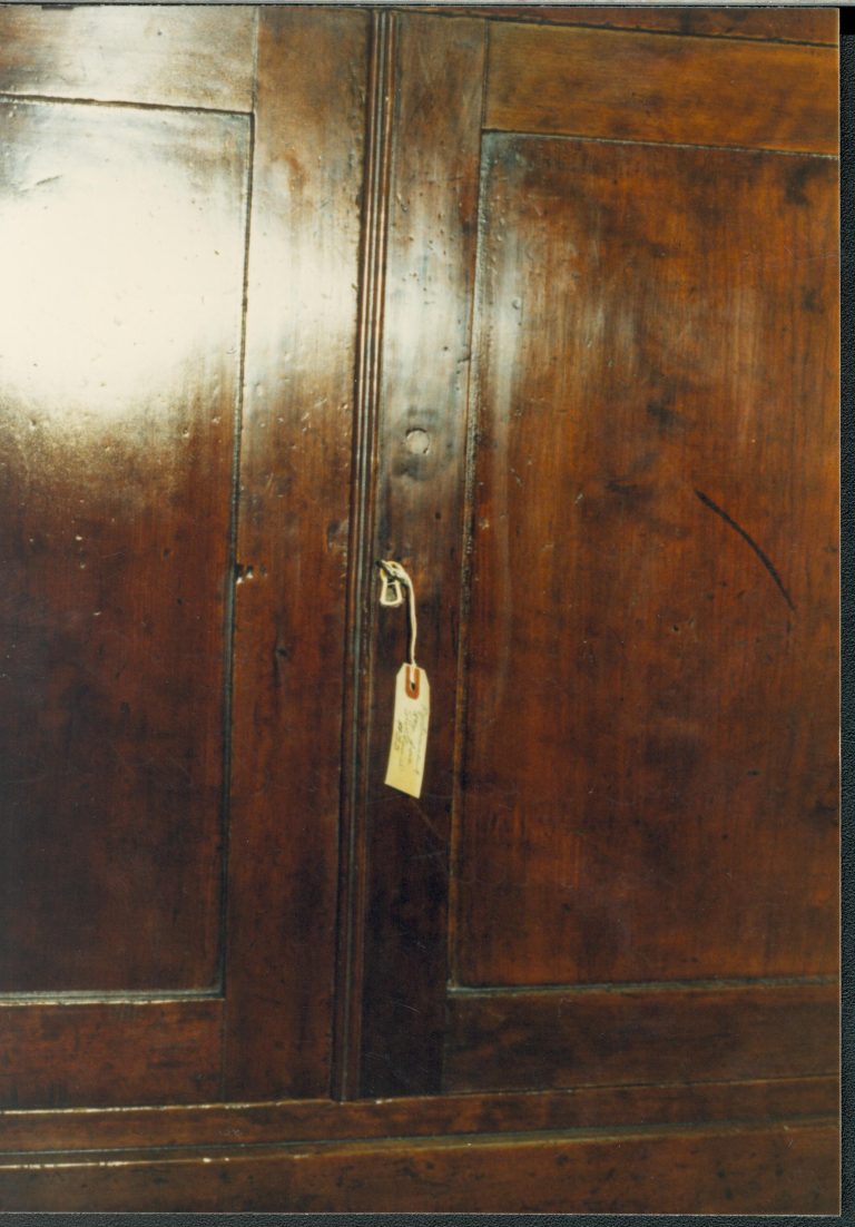 Shows repair to lower right door: Removal of knob, esc. replacement astragal replacement. Also shows repair to lower case rail where doors meet Lincoln Home NHS Lincoln #33 furnishings