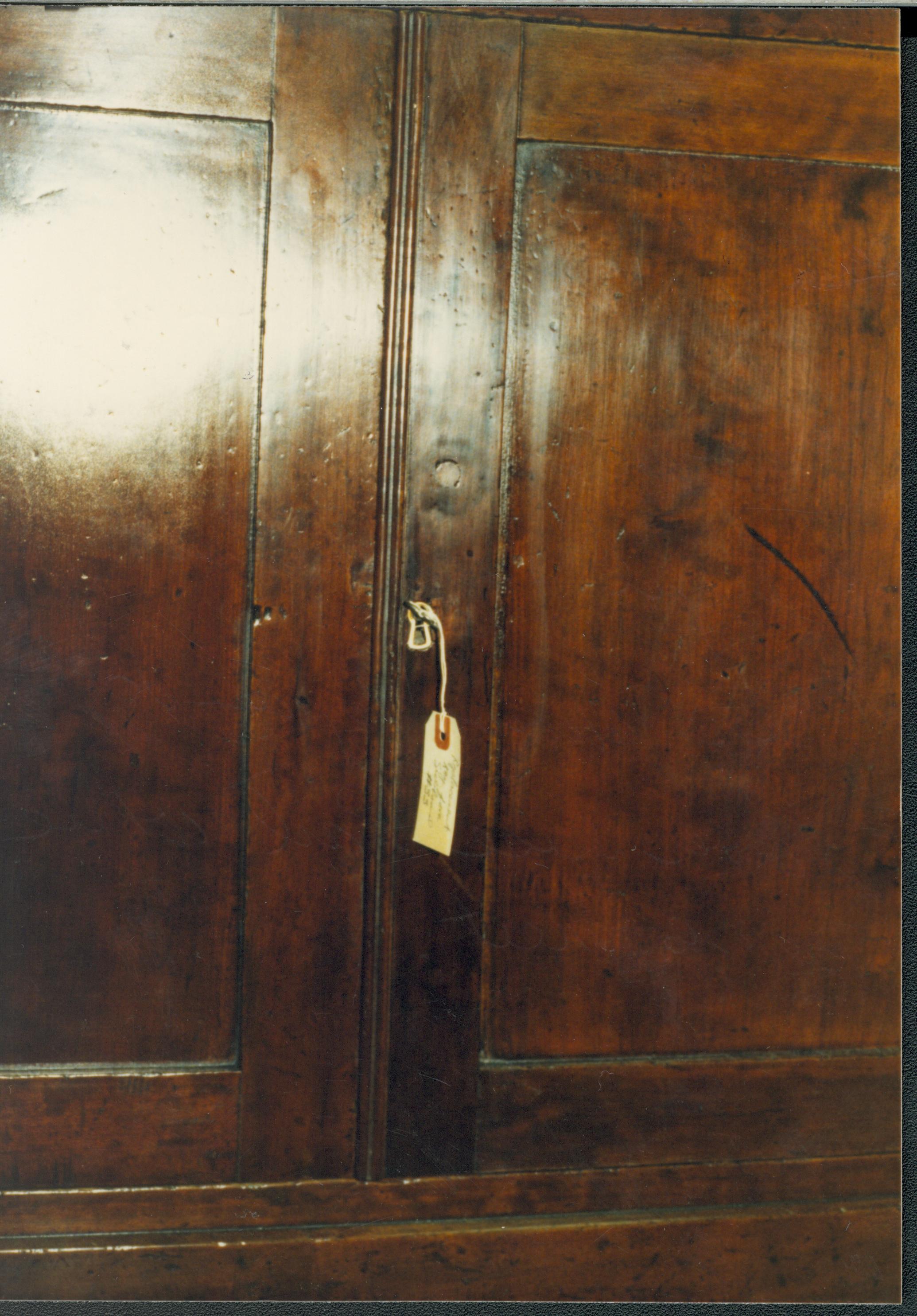 Shows repair to lower right door: Removal of knob, esc. replacement astragal replacement. Also shows repair to lower case rail where doors meet Lincoln Home NHS Lincoln #33 furnishings