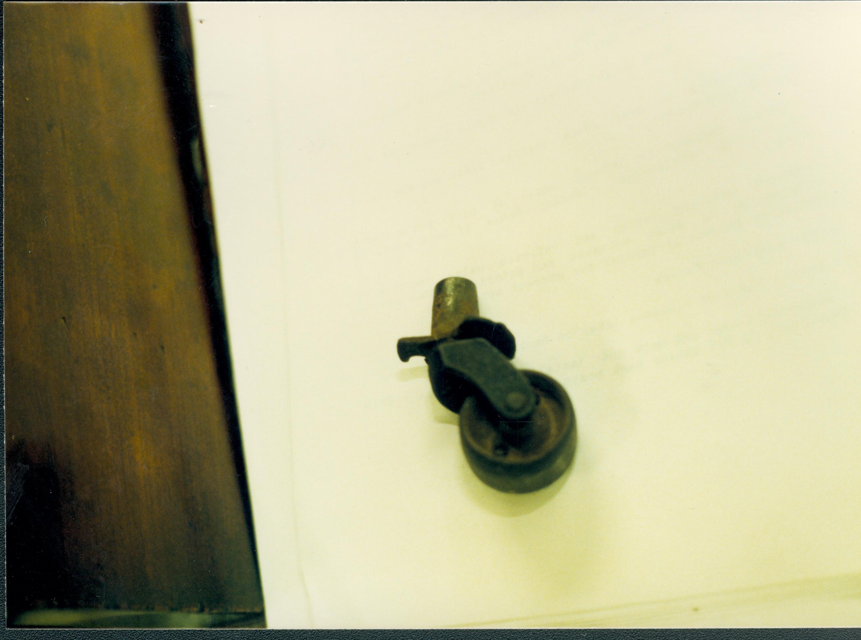 broken caster from left front Lincoln Home NHS  #33 furnishings