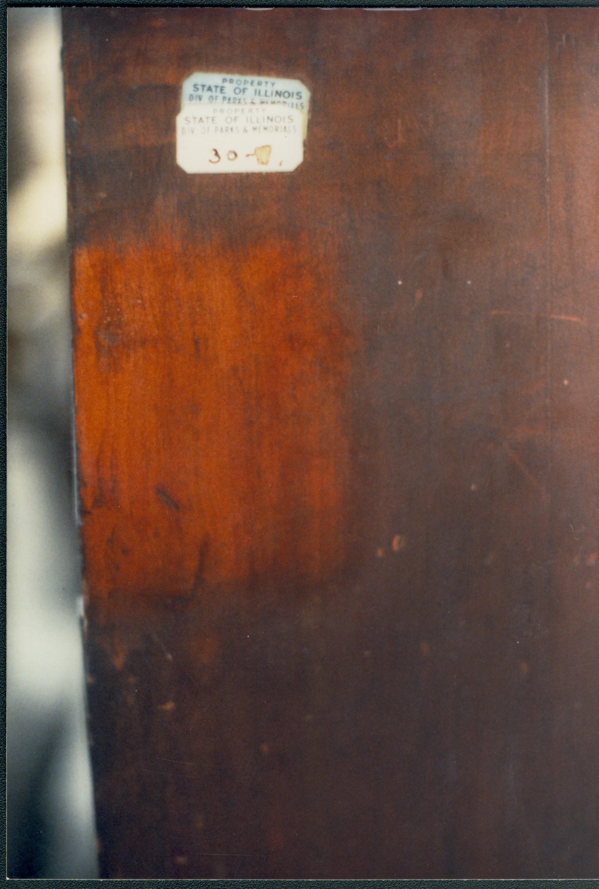 photo shows left side with a patch cleaned. Also shows old state of Illinois labels later removed Lincoln Home NHS Lincoln #33 furnishings