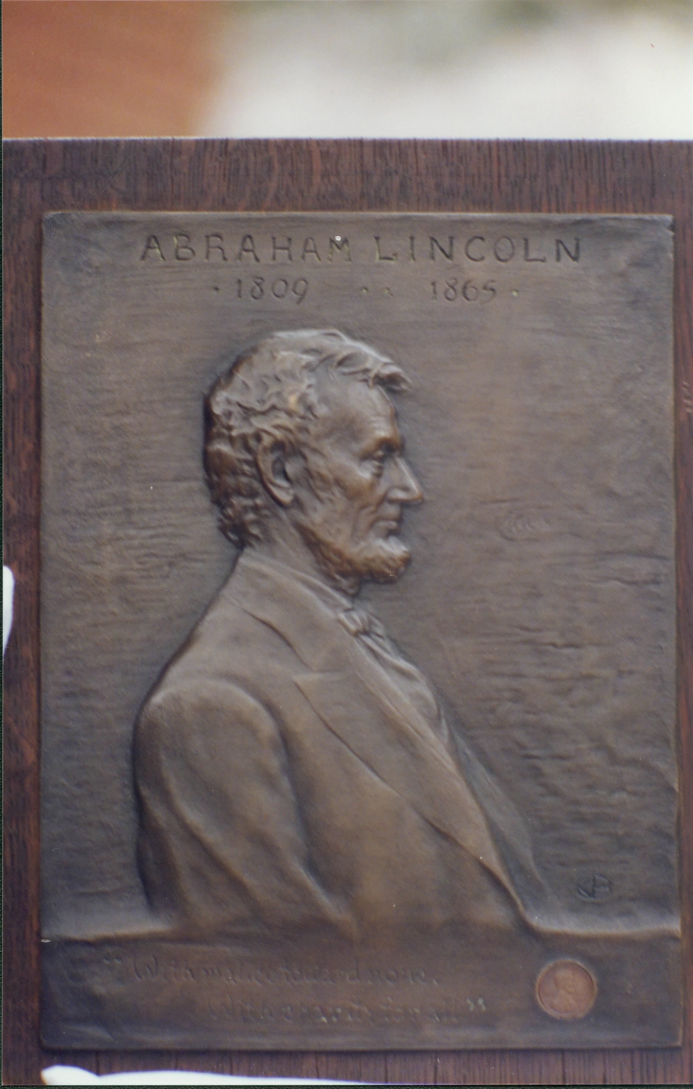 bronze placque of Abraham Lincoln Lincoln Home NHS, Nation Mourns, 2211 exhibit, placque