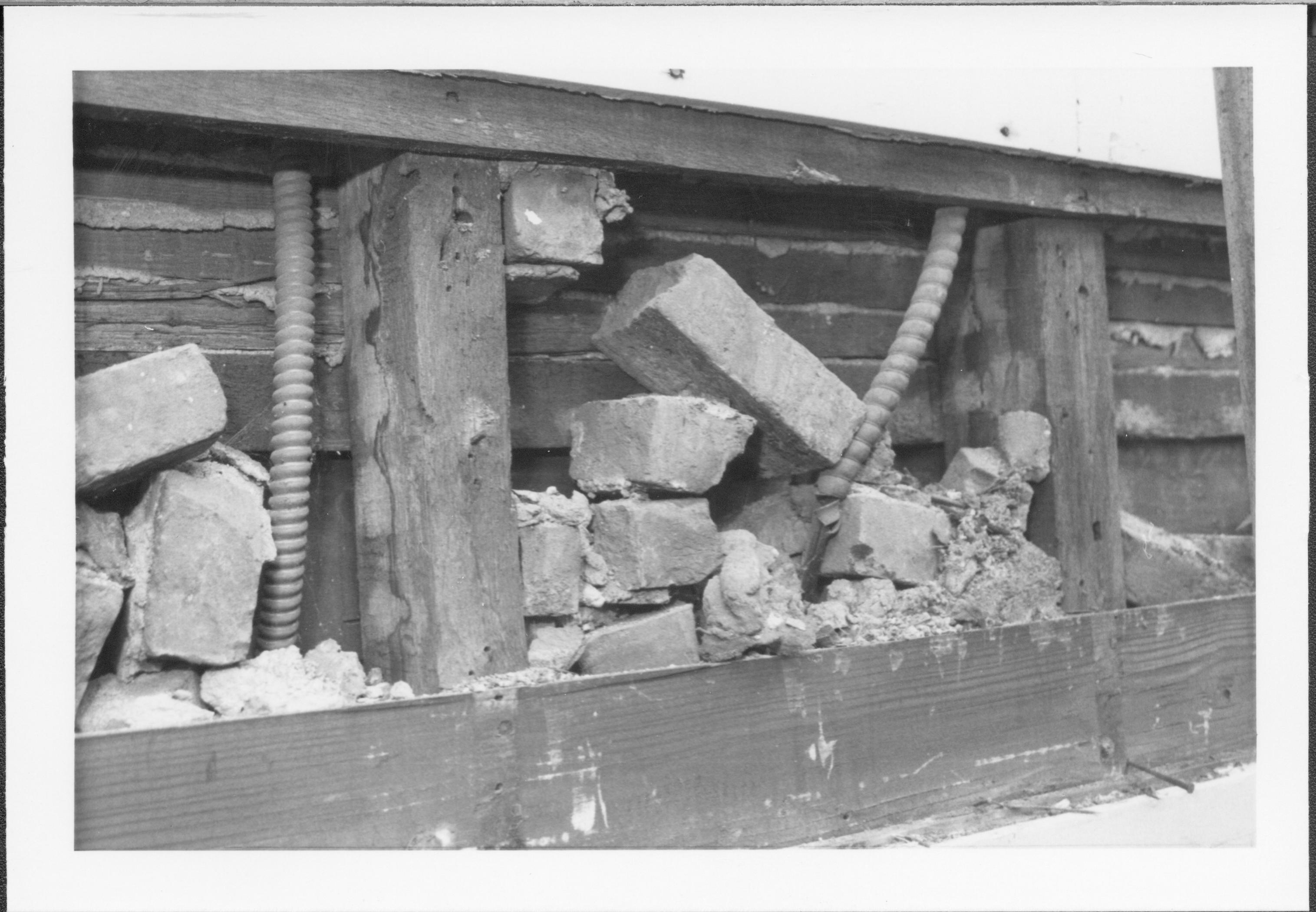 photos of front porch ceiling, below and of interior framing between porch ceiling and 2nd floor joists Lincoln Home NHS, renovation, outer wall renovation, investigation