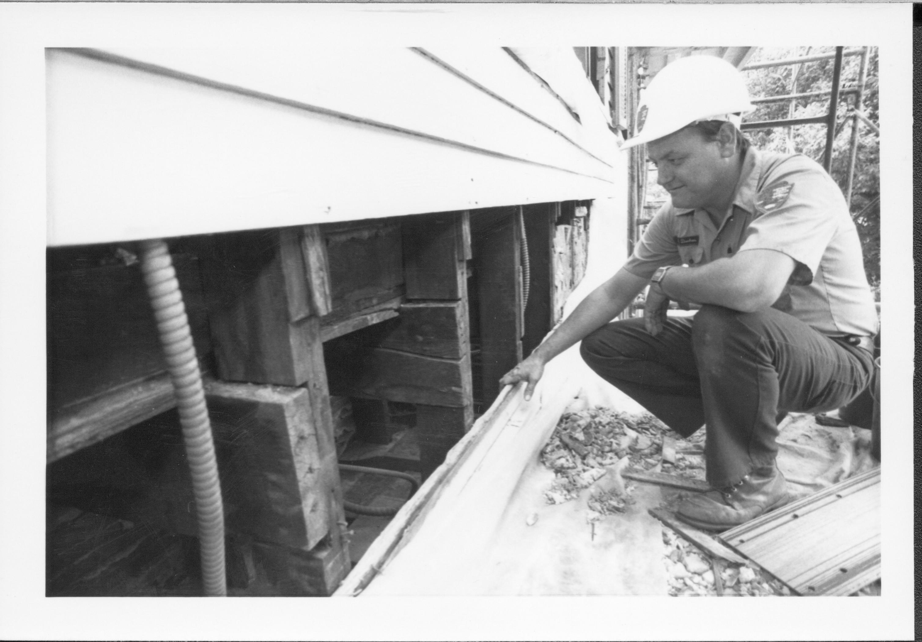 photos of front porch ceiling, below and of interior framing between porch ceiling and 2nd floor joists Lincoln Home NHS, renovation renovation, investigation