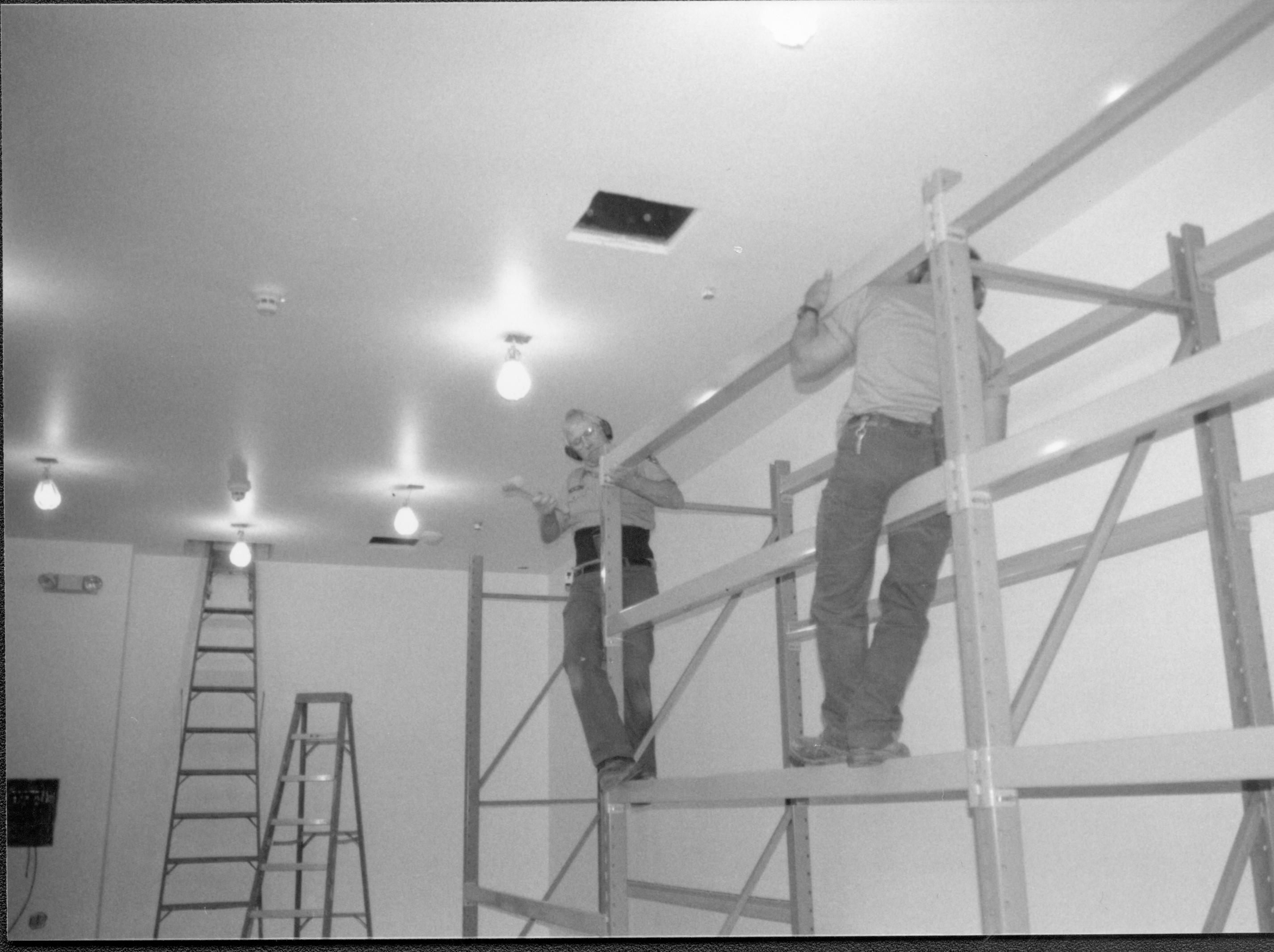 Storage shelves built and installed along the North wall in the Arnold Barn facility Lincoln Home NHS, CRS Collection Move, Arnold Barn, Roll N11, exp 14, sheet 4 of 5 Arnold Barn, move, storage