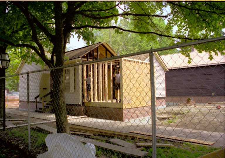 Construction of Room 105; West and North walls of the structure. Studs in place and plywood being attached Lincoln Home NHS, HS-2, CRS Collection Move, Arnold Barn, Roll N8, exp 7 Corneau, renovation