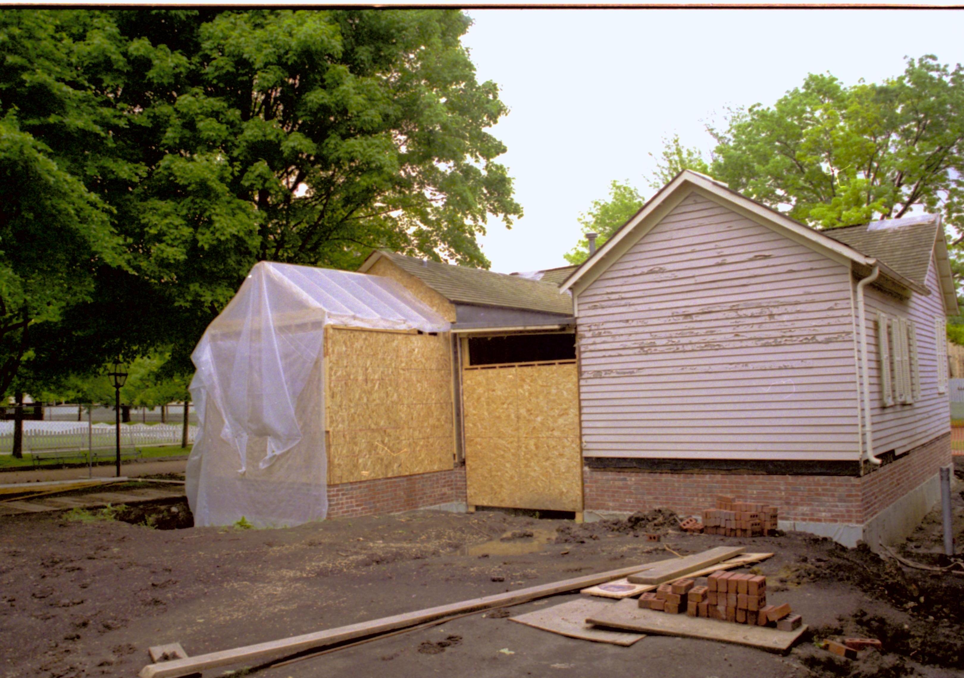 West wall of house, room 105 under construction. Foundations clearly seen Lincoln Home NHS, CRS Collection Move, Arnold Barn, Room 105, Roll N8, exp 23 Corneau, renovation