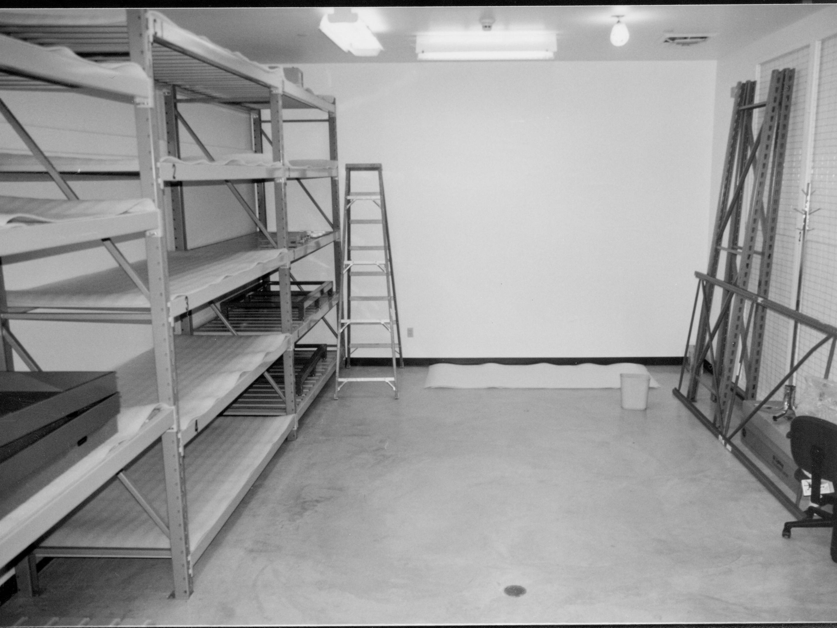 Room as being assembled with storage units. Taken looking at East wall, with North wall on the left side of the photo Lincoln Home NHS, CRS Collection Move, Arnold Barn, Facing East Wall, Roll N10, exp 1, sheet 1 of 7 Arnold Barn, renovation