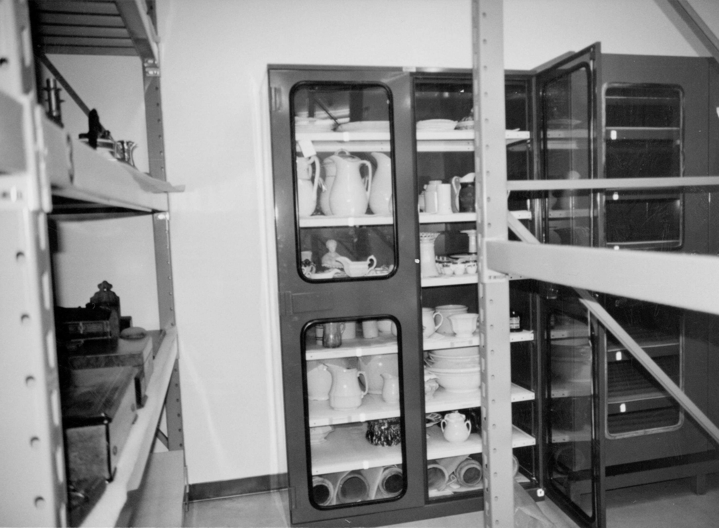 Stand in North aisle, facing East wall Lincoln Home NHS, CRS Collection Move, Facing East Wall, Roll N10, exp 11 sheet 3 of 7 Arnold Barn, storage, artifacts