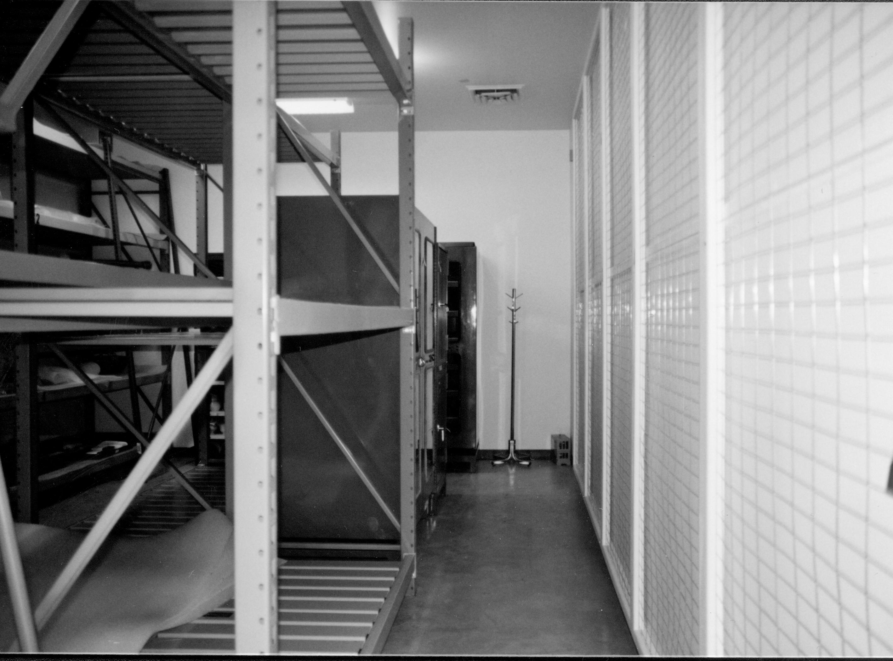 South aisle. Book and artifact cabinets installed. Art wall at left of photo Lincoln Home NHS, CRS Collection Move, South and East Walls, Roll N10, exp 20 sheet 5 of 7 Arnold Barn, storage, artifacts