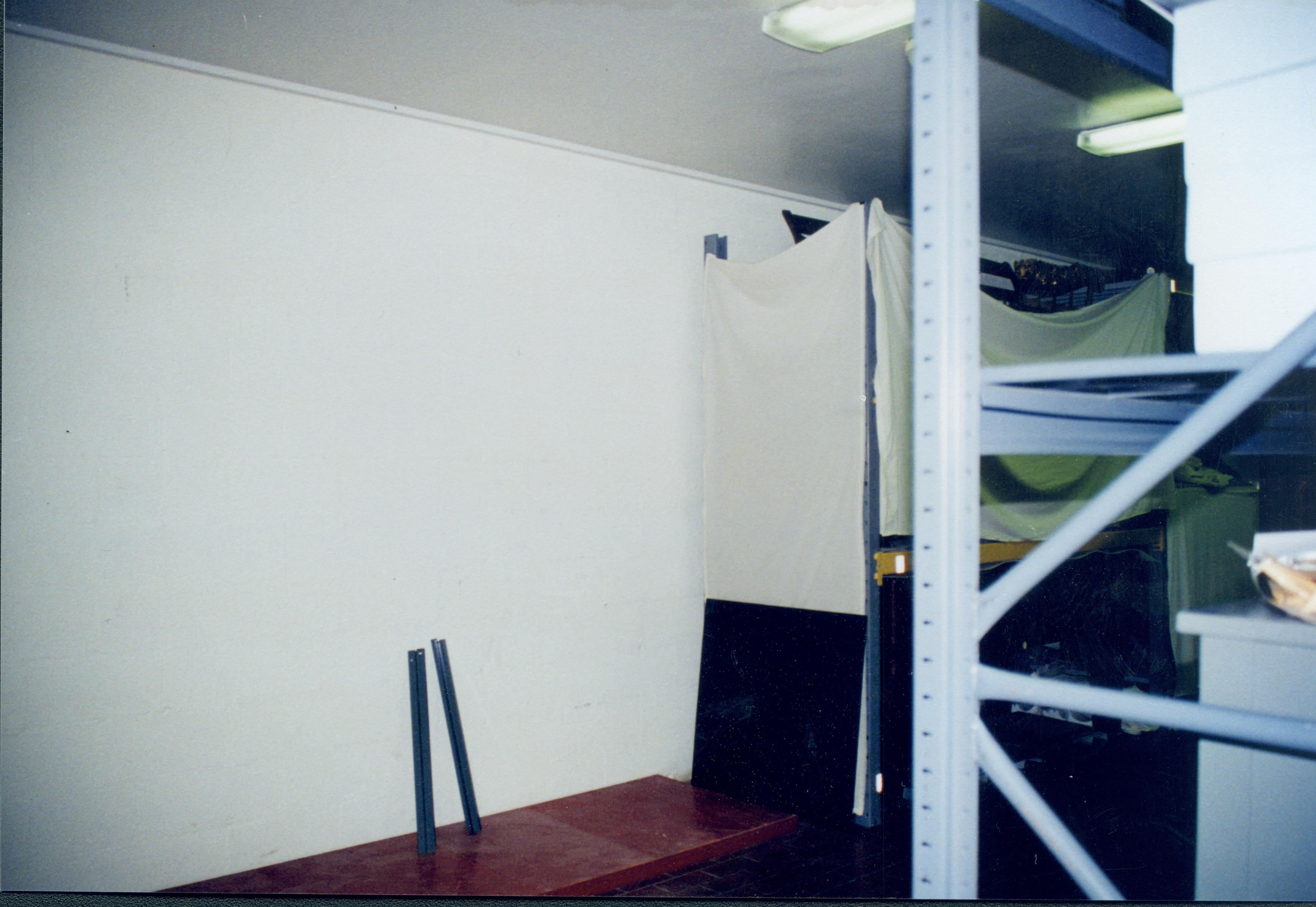 Looking at East wall, towards North end of room; empty space where the glass fronted, gray cabinets used to be Lincoln Home NHS, 1998 CRS Collection Move, Roll N7, exp 2 sheet 1 of 9 Carriage House, storage room