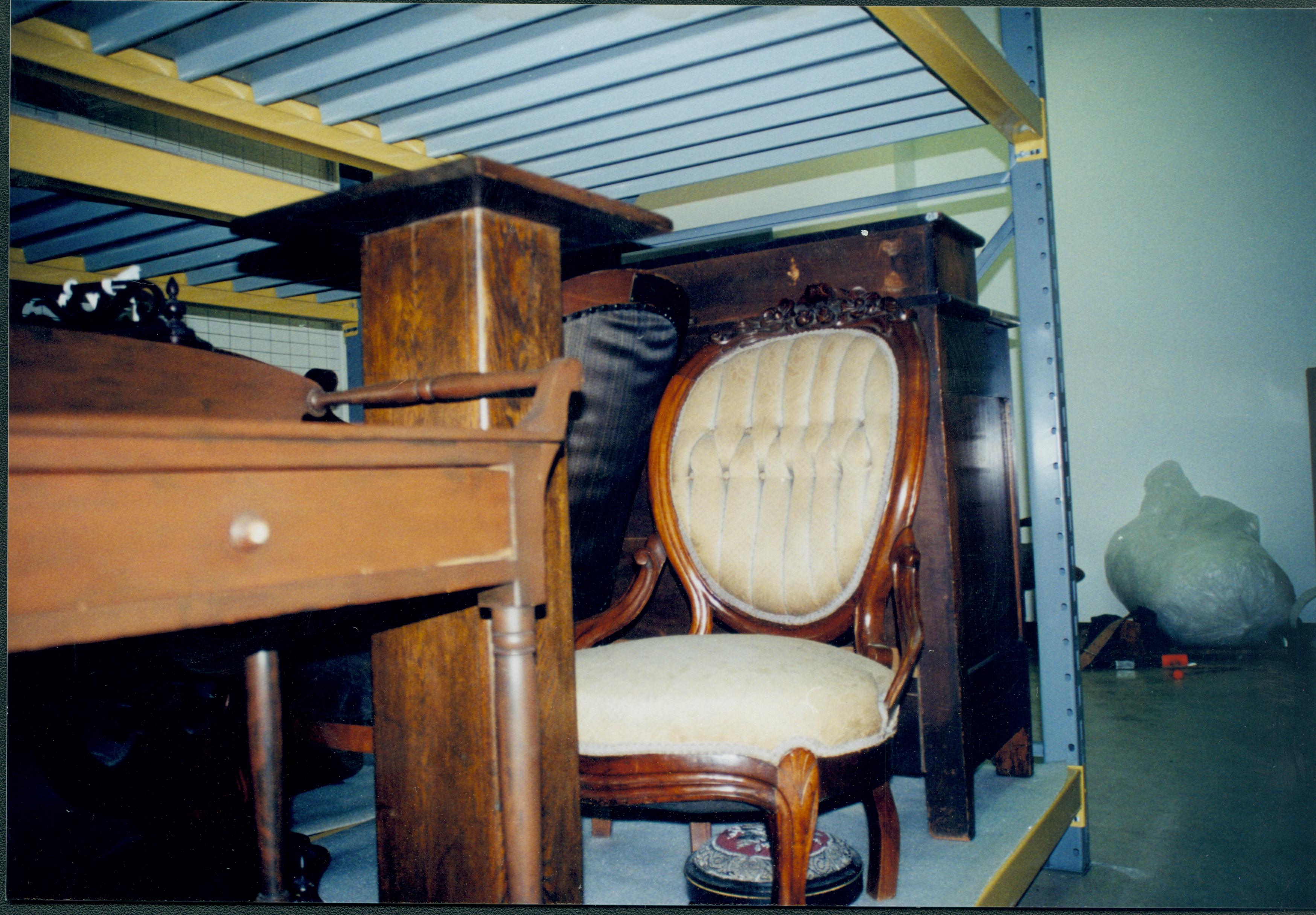 Whatnot, podium, chairs, etc. held in collection; K3 storage space Lincoln Home NHS, 1998 CRS Collection Move, Roll N7, exp 23 sheet 8 of 9 Arnold Barn, storage room, furnishings