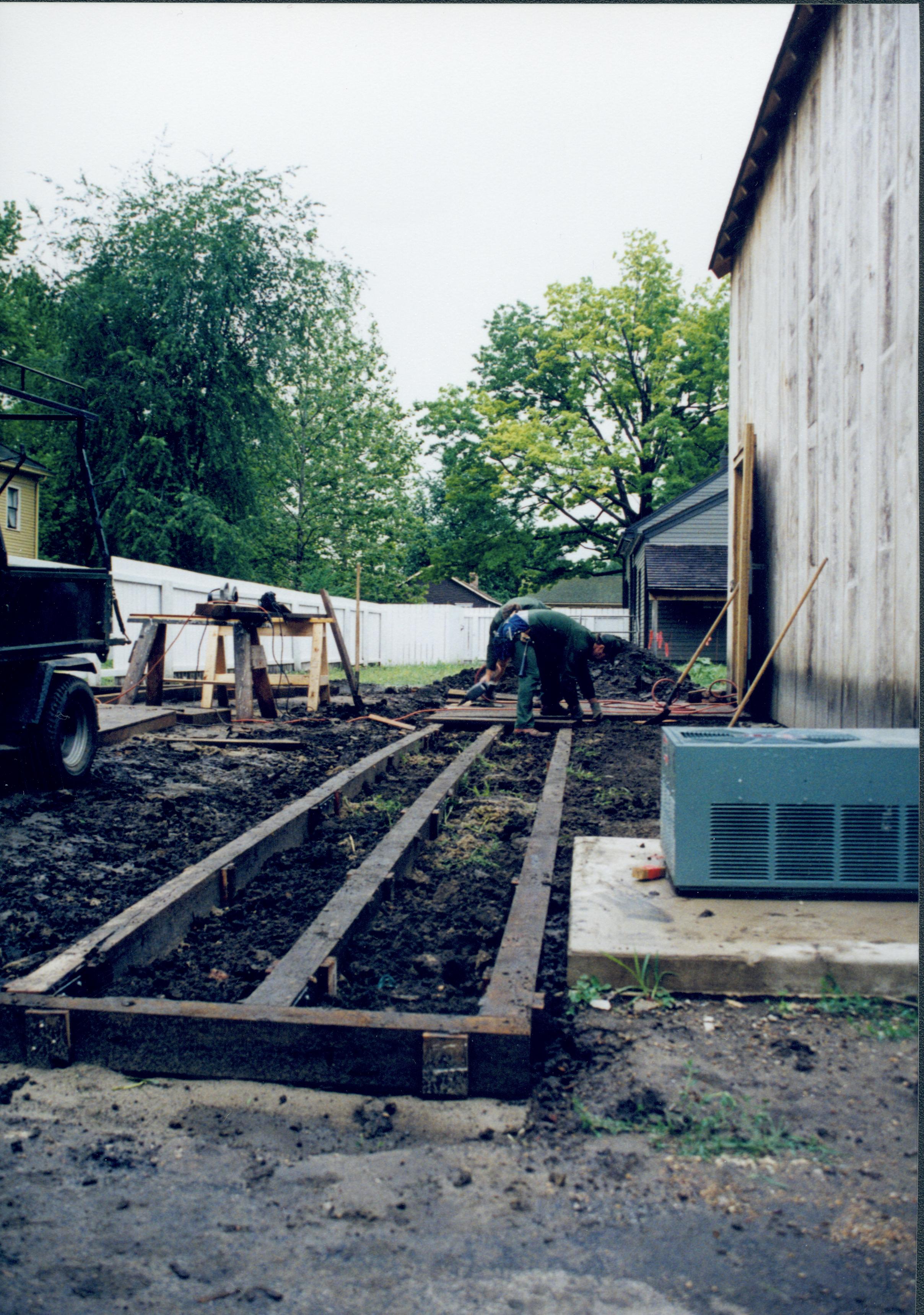 South side. Boardwalk installation on South side of structure; photo taken facing West (built by Ed Smith and Kirk Johnson) Lincoln Home NHS, Arnold Barn, Roll N9 exp #18, sheet 1 of 2 renovation, Arnold Barn, boardwalk