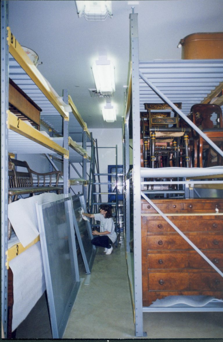 Preparing/cleaning map-case drawers for use in new location. Drawers cleaned and stacked in North aisle Lincoln Home NHS, CRS Artifacts Move, Roll N13, exp 4 sheet 2 of 6 