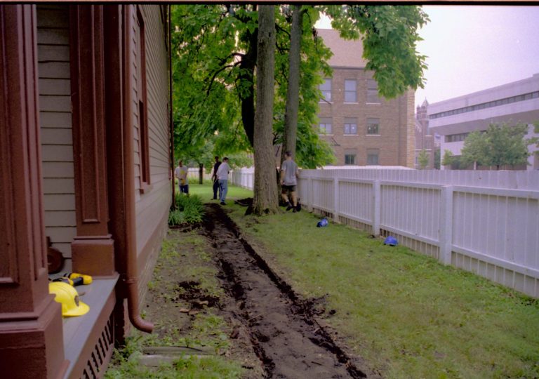 In process of removing boardwalk in order to install new (north side of lot) Lincoln Home NHS, CRS Artifacts Move, Beedle, Lyon, Corneau, Roll N13, exp 12 Beedle House, renovation