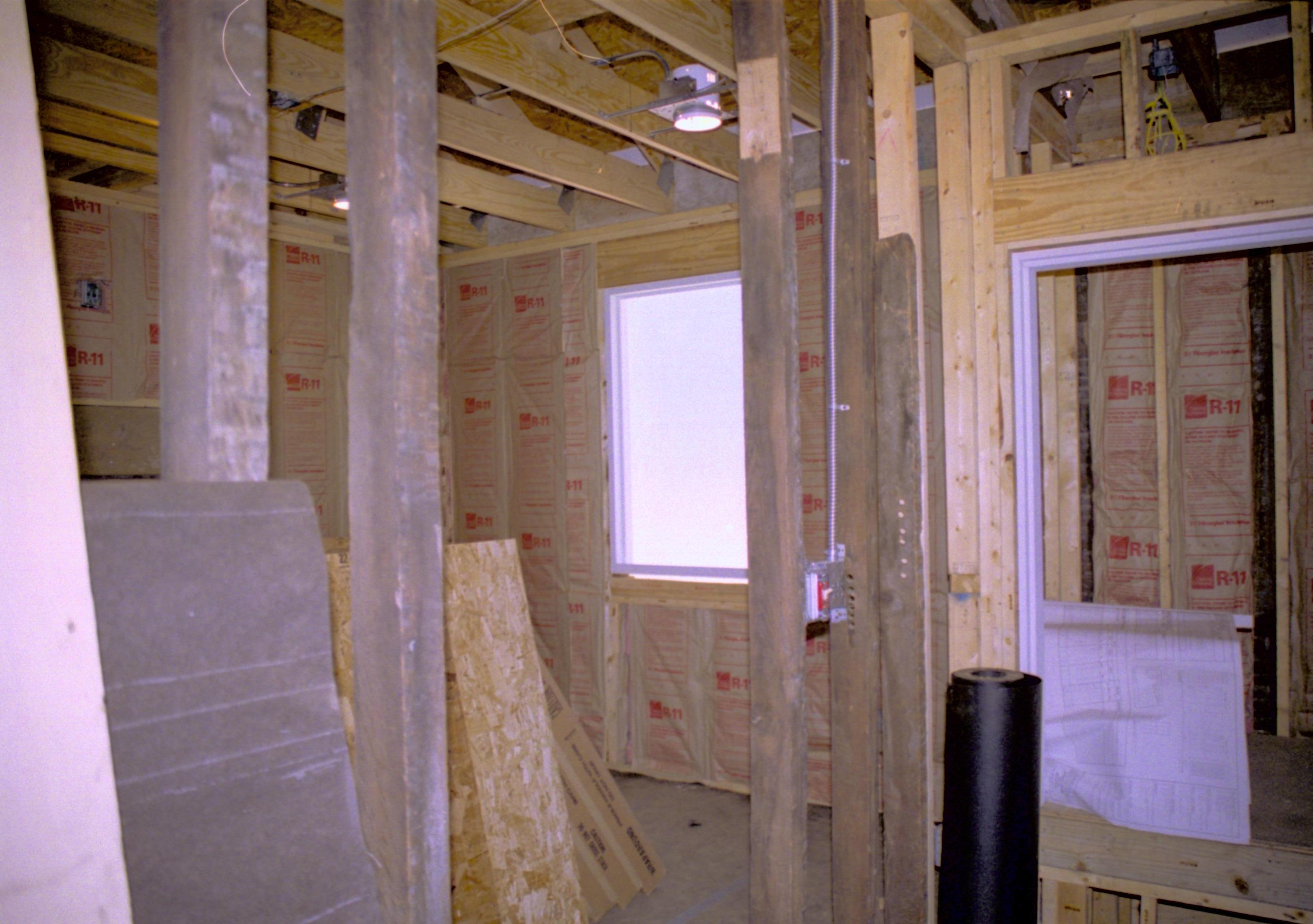 North Hallway, North wall and window being installed. Lincoln Home NHS, roll N9 Corneau, Arnold Barn, Sprigg, North Hallway and window renovation, construction