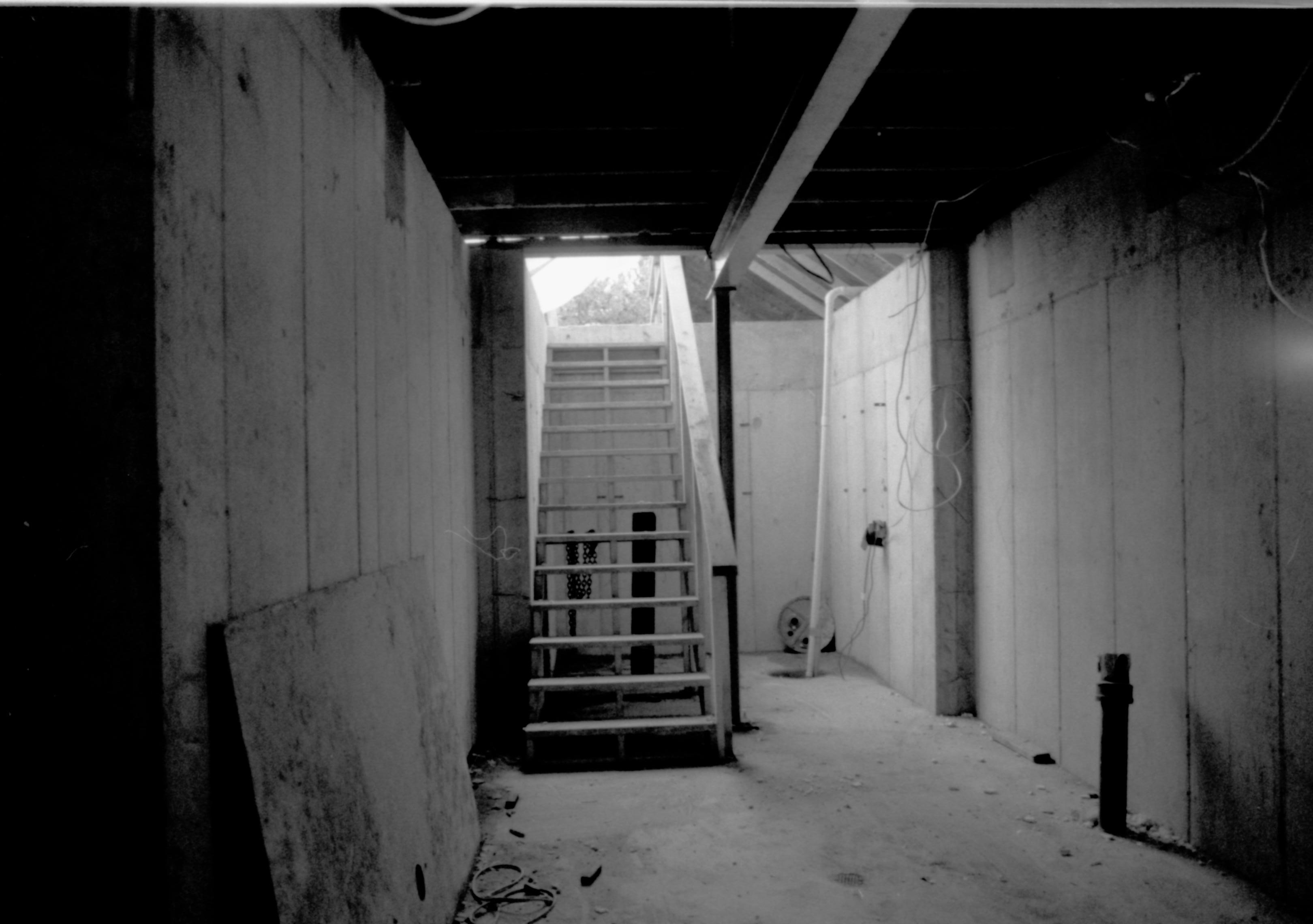 Looking towards West wall, stiarcase down to basement in center of photo Lincoln Home NHS, CRS Artifacts Move, Looking West, Roll N11, exp 23 Corneau House, renovation