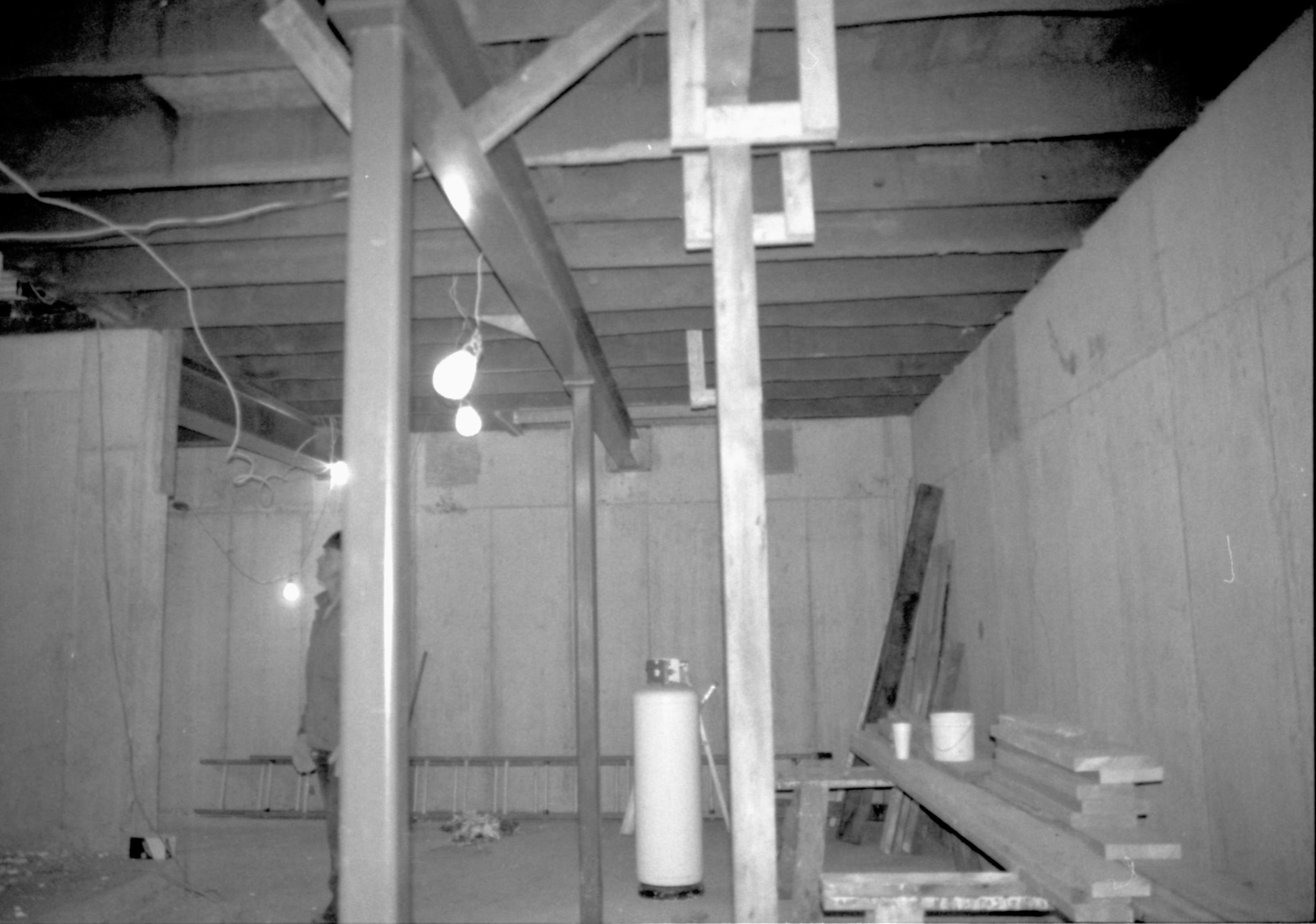 Looking North across basement (photo taken standing next to South wall); North wall and Northeast corner in center of photo Lincoln Home NHS, CRS Artifacts Move, North wall, Roll N11, exp 25 Corneau House, renovation